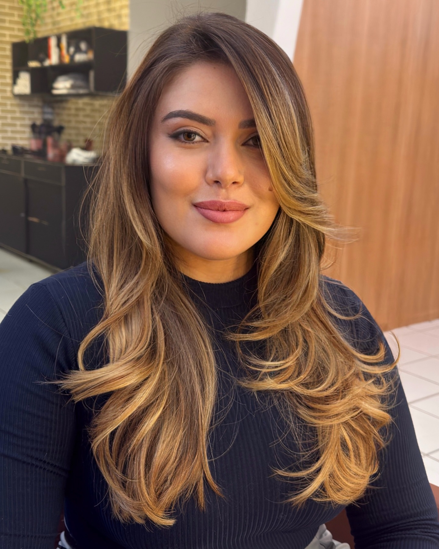 Warm Bronde Long Layers with Feathered Face‑Framing Ends