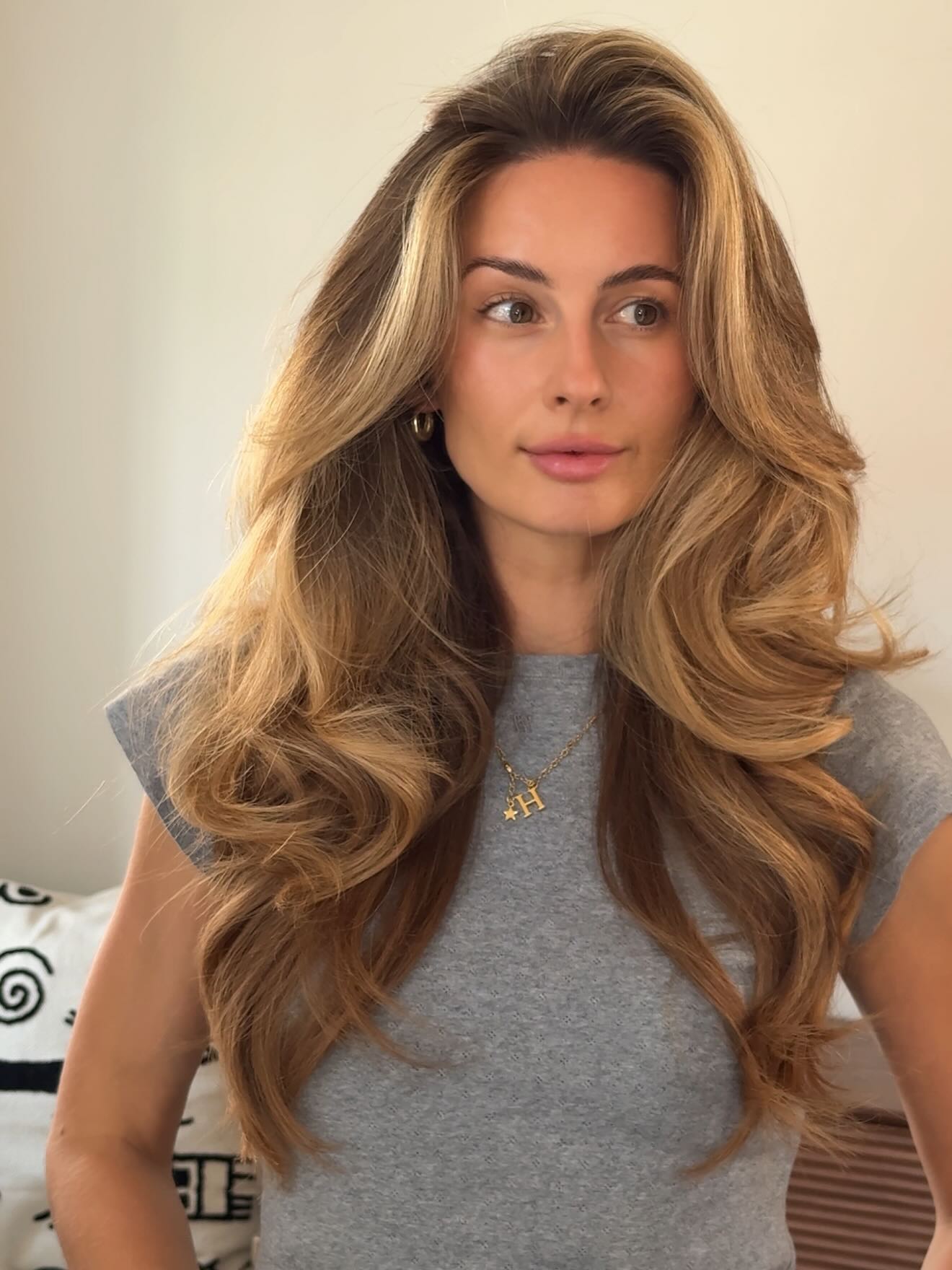 Warm Caramel Face-Framing Long Layers with Curtain Blowout