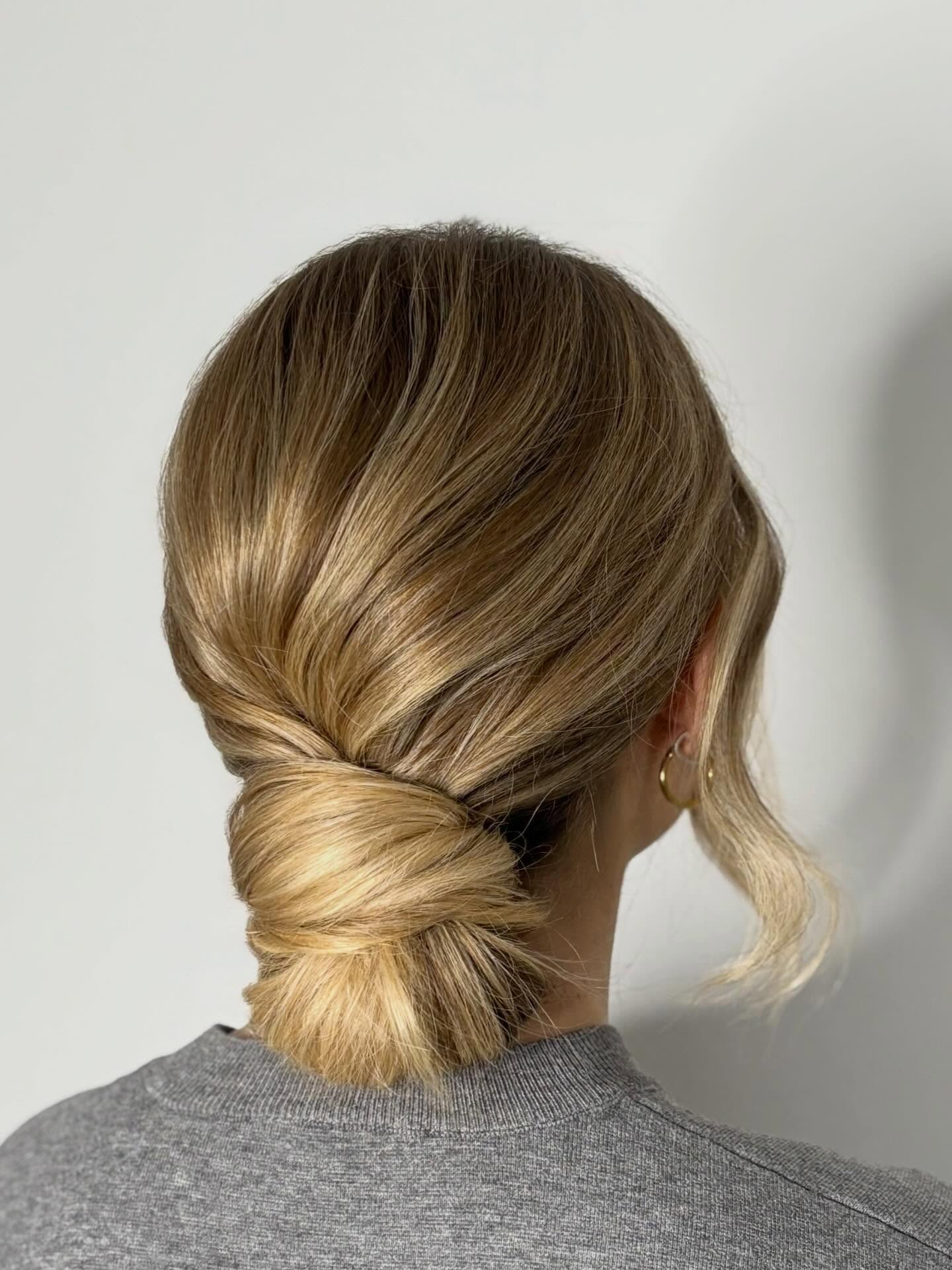 Wrapped Low Tuck Bun with Brushed-Back Layers