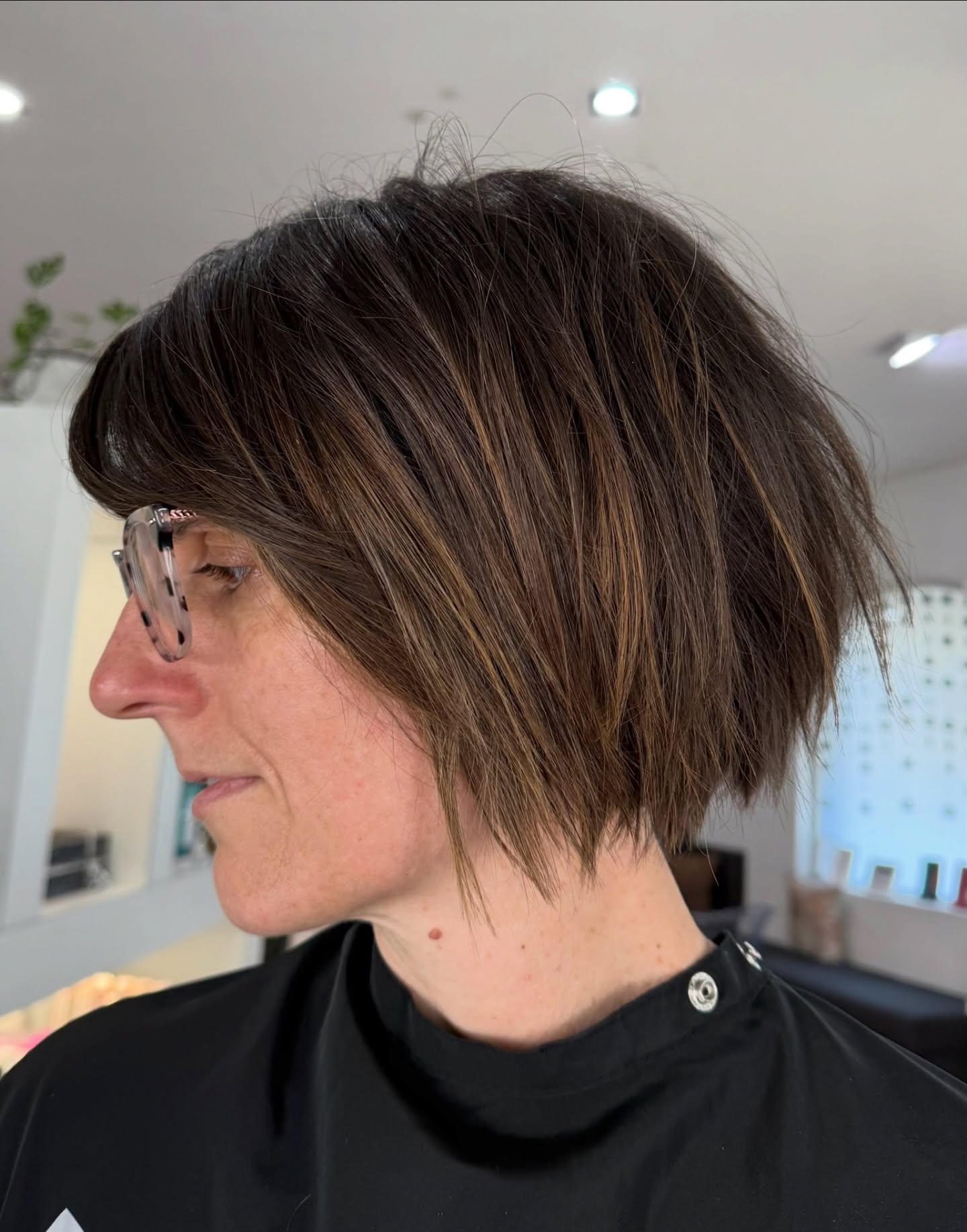 Angled Textured Short Bob with Razored Ends and Soft Curtain Fringe