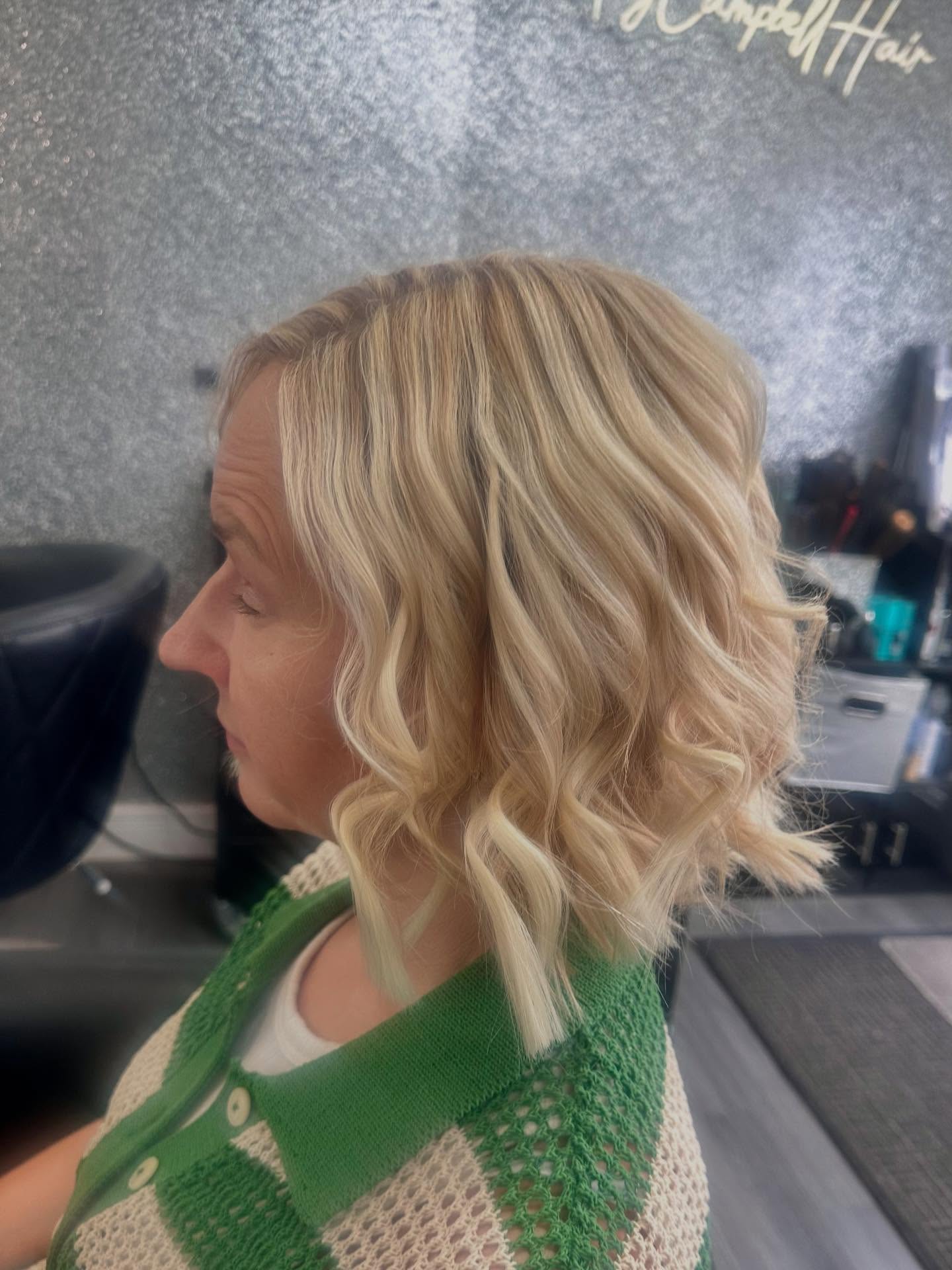 Chic Textured Short Blonde Bob with Soft Face-Framing Layers