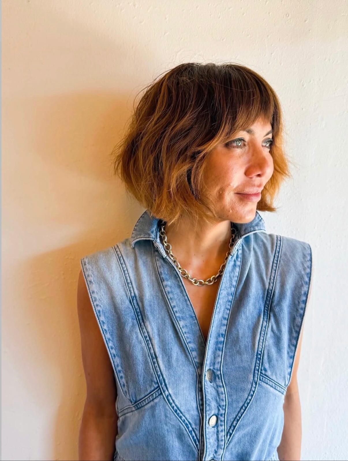 Chin-Length Textured Copper Bob with Short Wispy Fringe