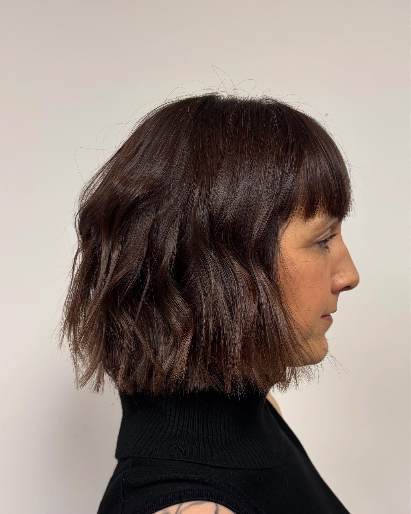 Choppy Jaw-Length Bob with Blunt Micro Fringe and Razor-Textured Ends