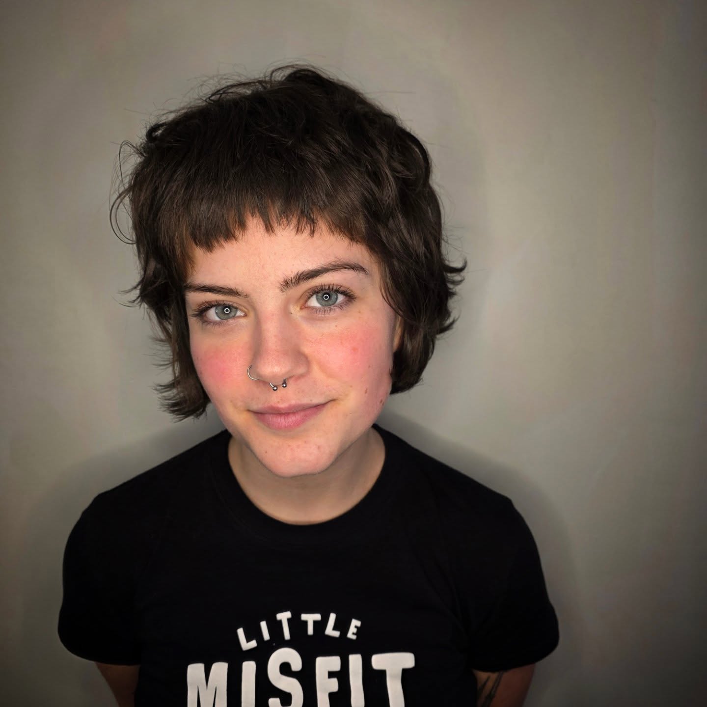 Choppy Pixie Crop with Scalloped Micro Bangs and Flipped Perimeter