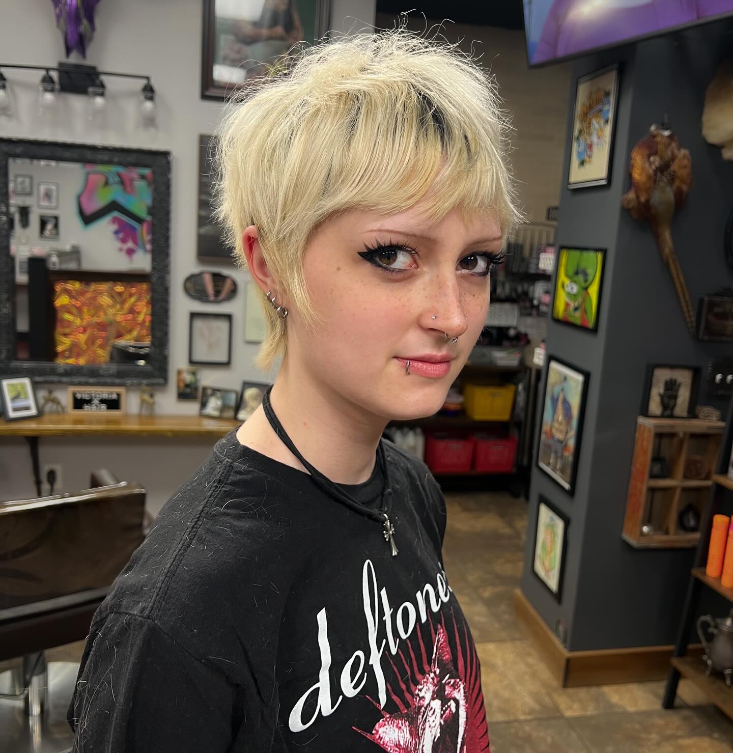 Choppy Platinum Pixie with Feathered Nape and Micro Curtain Bangs