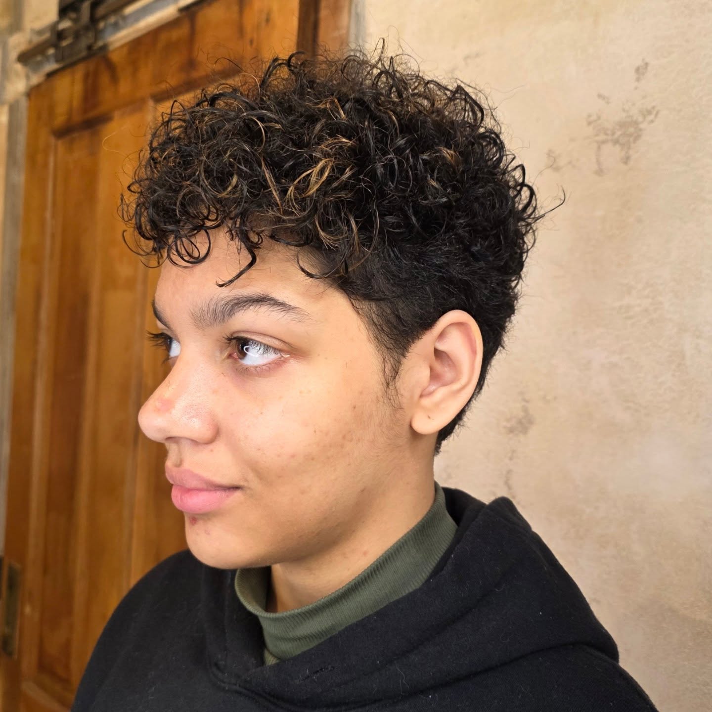 Curly Tapered Pixie with Caramel Peek-Through Highlights