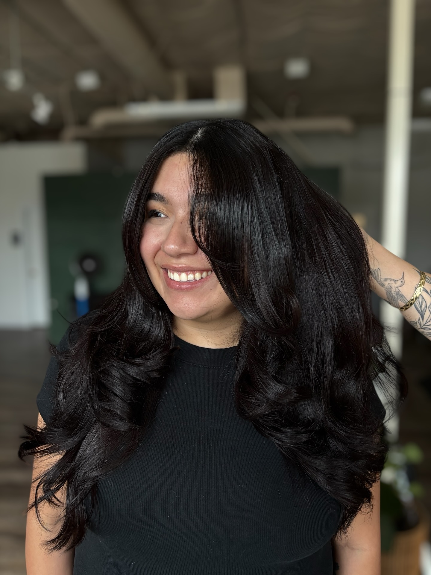 Deep Black Long Layered Cut with Rounded Blowout and Face-Framing Curtain