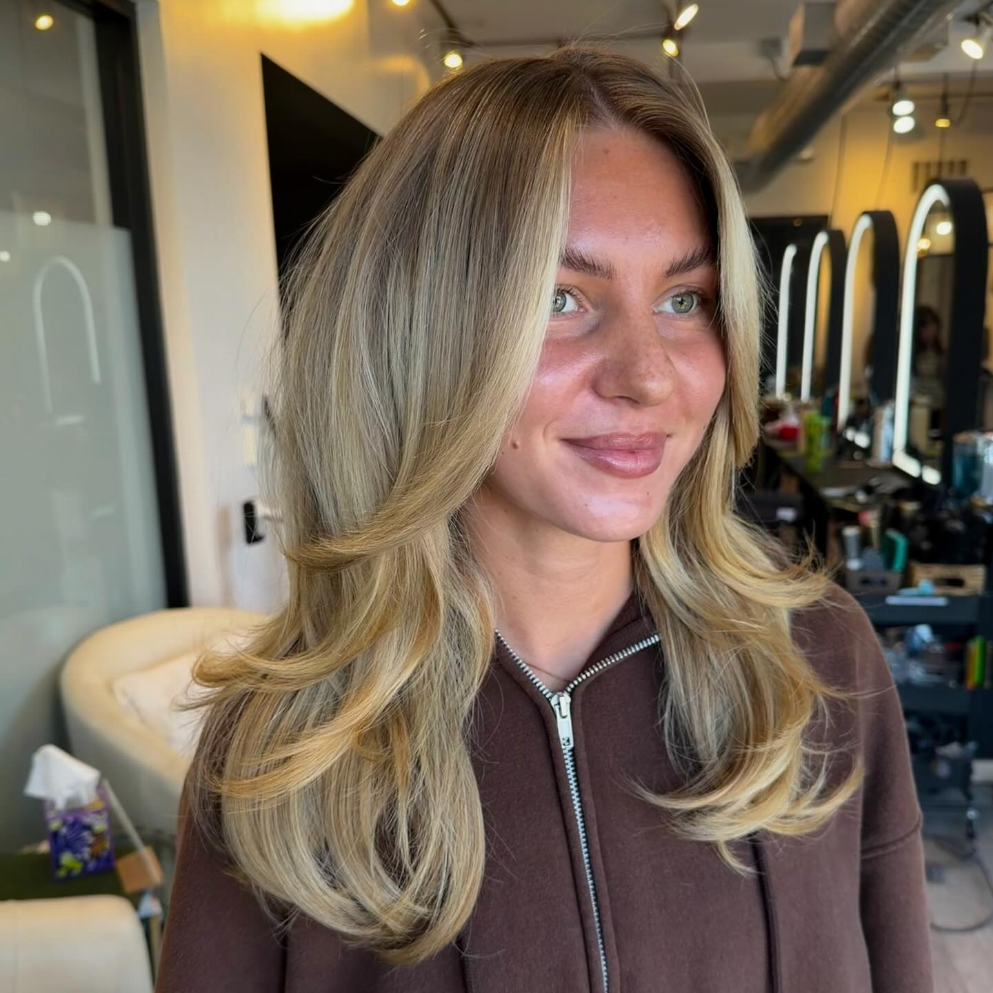 Dusky Blonde Long Curtain Layers with Rounded Blowout