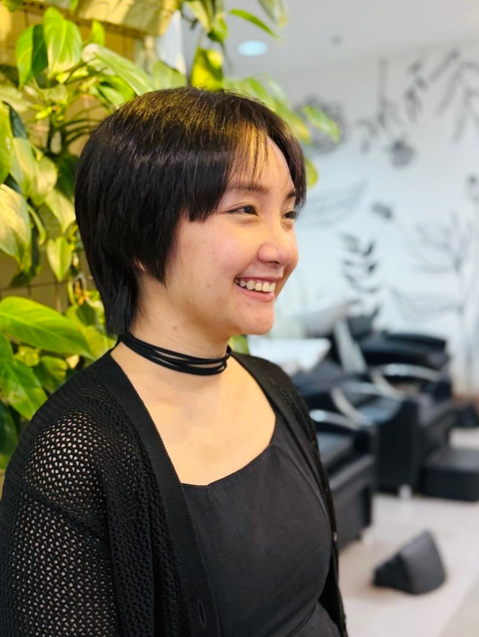 Ear-Length Layered Bob with Soft Center-Settled Fringe