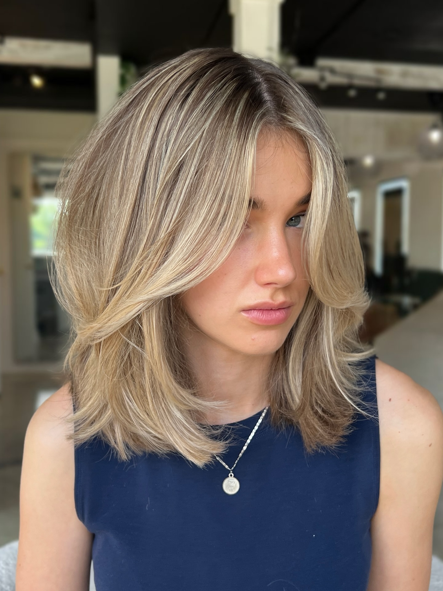 Feathered Blonde Lob with Curtain-Fringe Layers