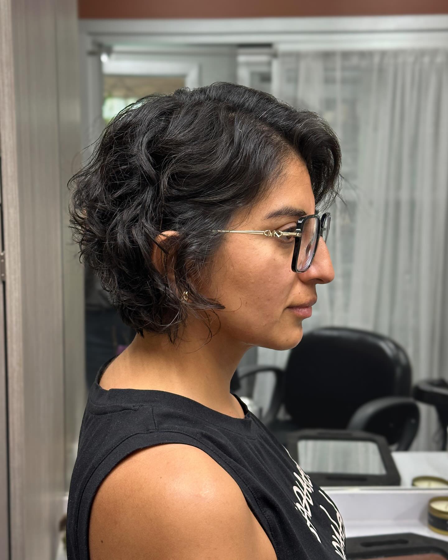 Glasses-Friendly Short Textured Wavy Pixie-Bob with Soft Nape Taper