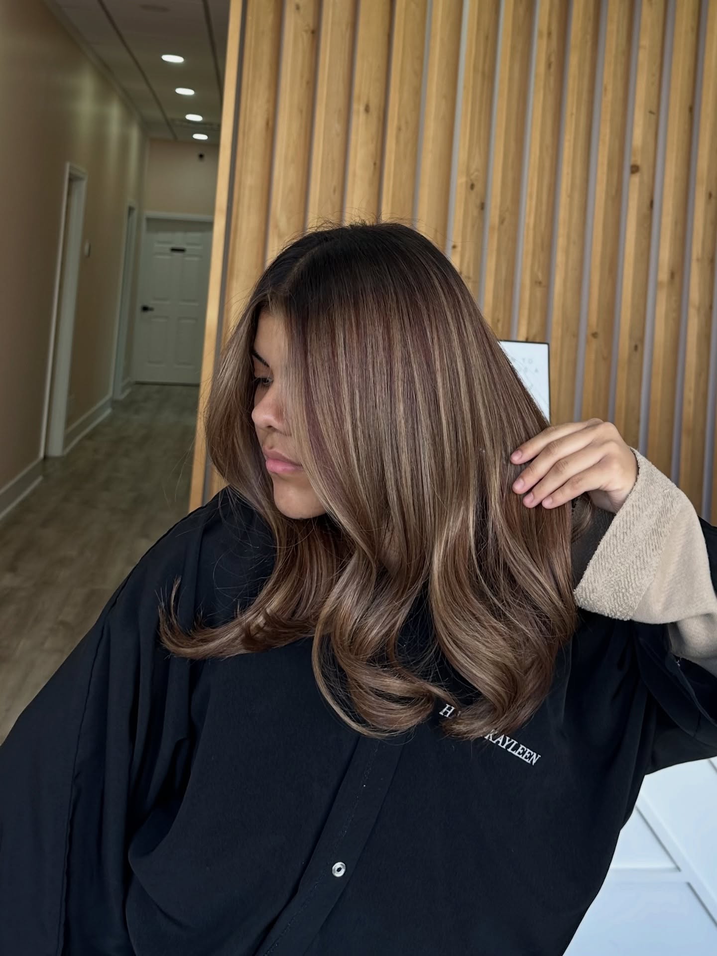 Glossy Bronde Long Layers with Soft Face‑Framing Slices