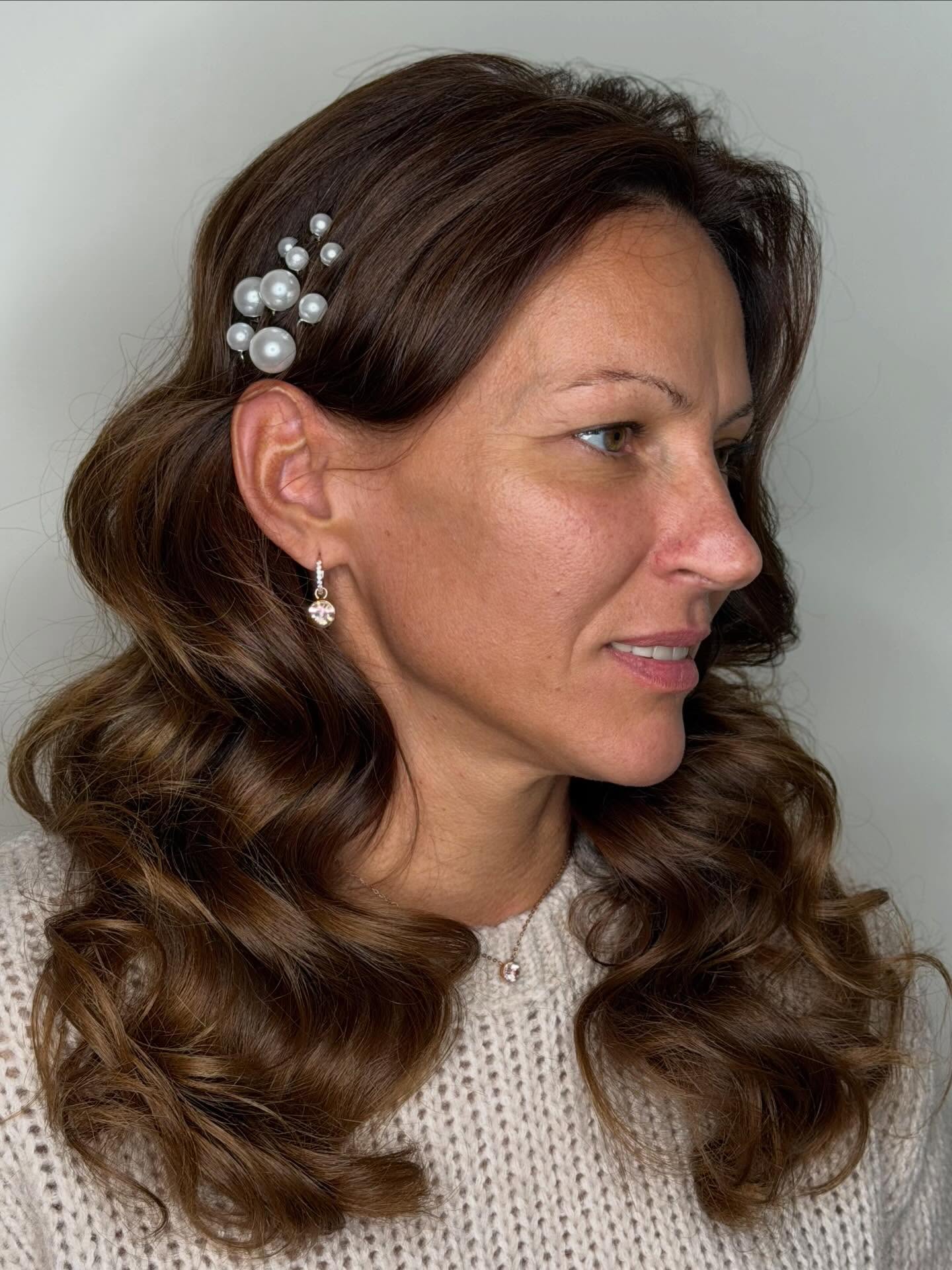 Glossy Chocolate Barrel Waves with Pearl Pin Accent