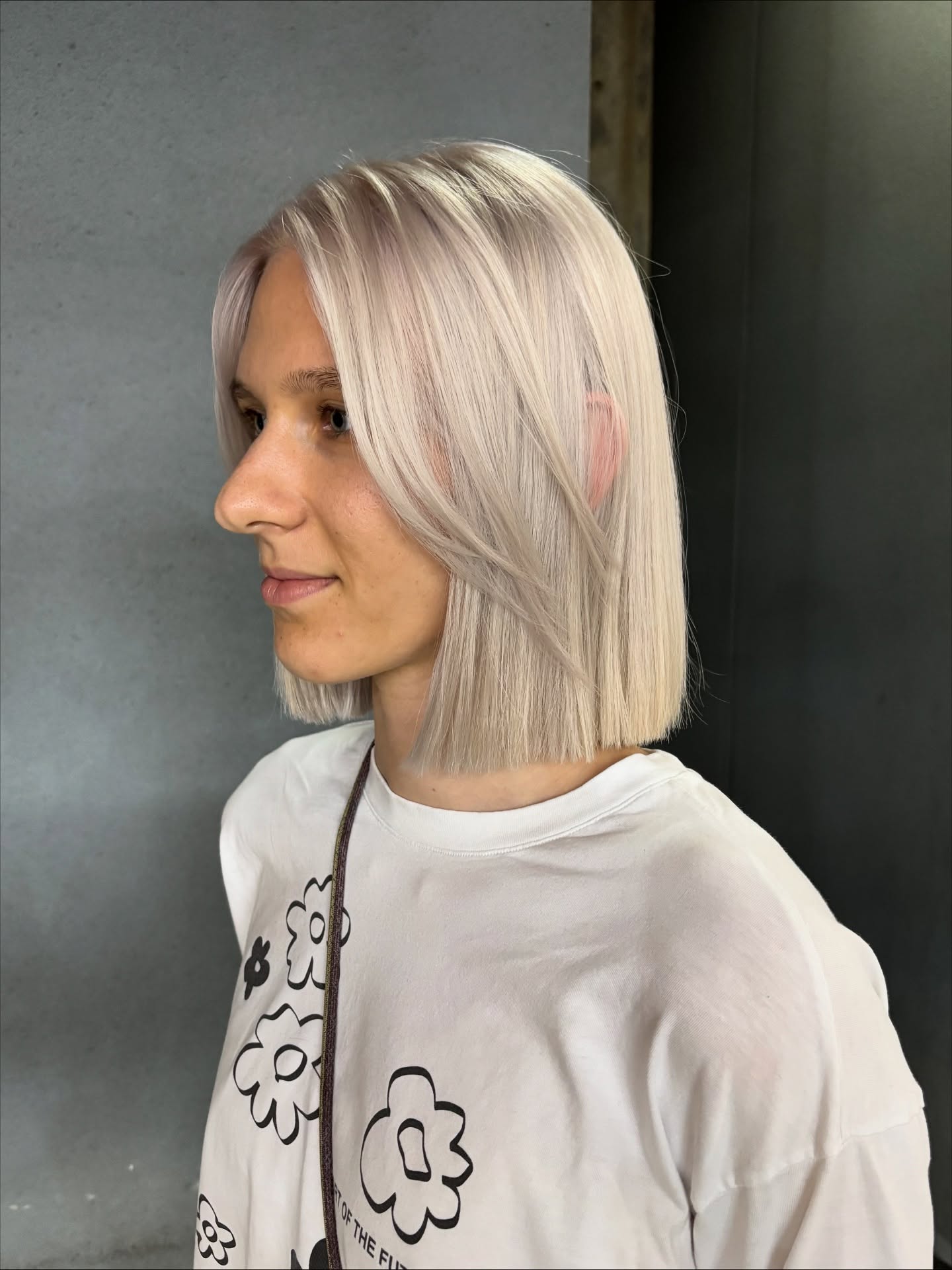 Icy Platinum Blunt Bob with Soft Curtain Framing