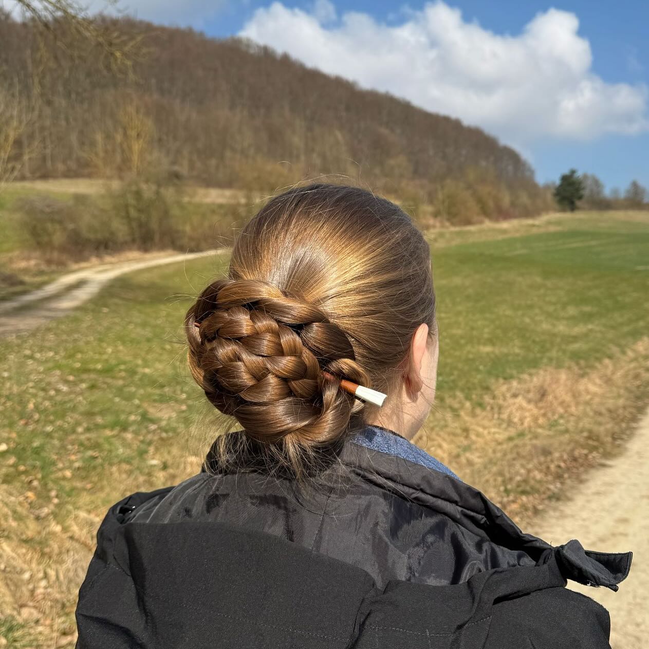 Interlaced Rosette Braided Low Bun with Tapered Hair Stick