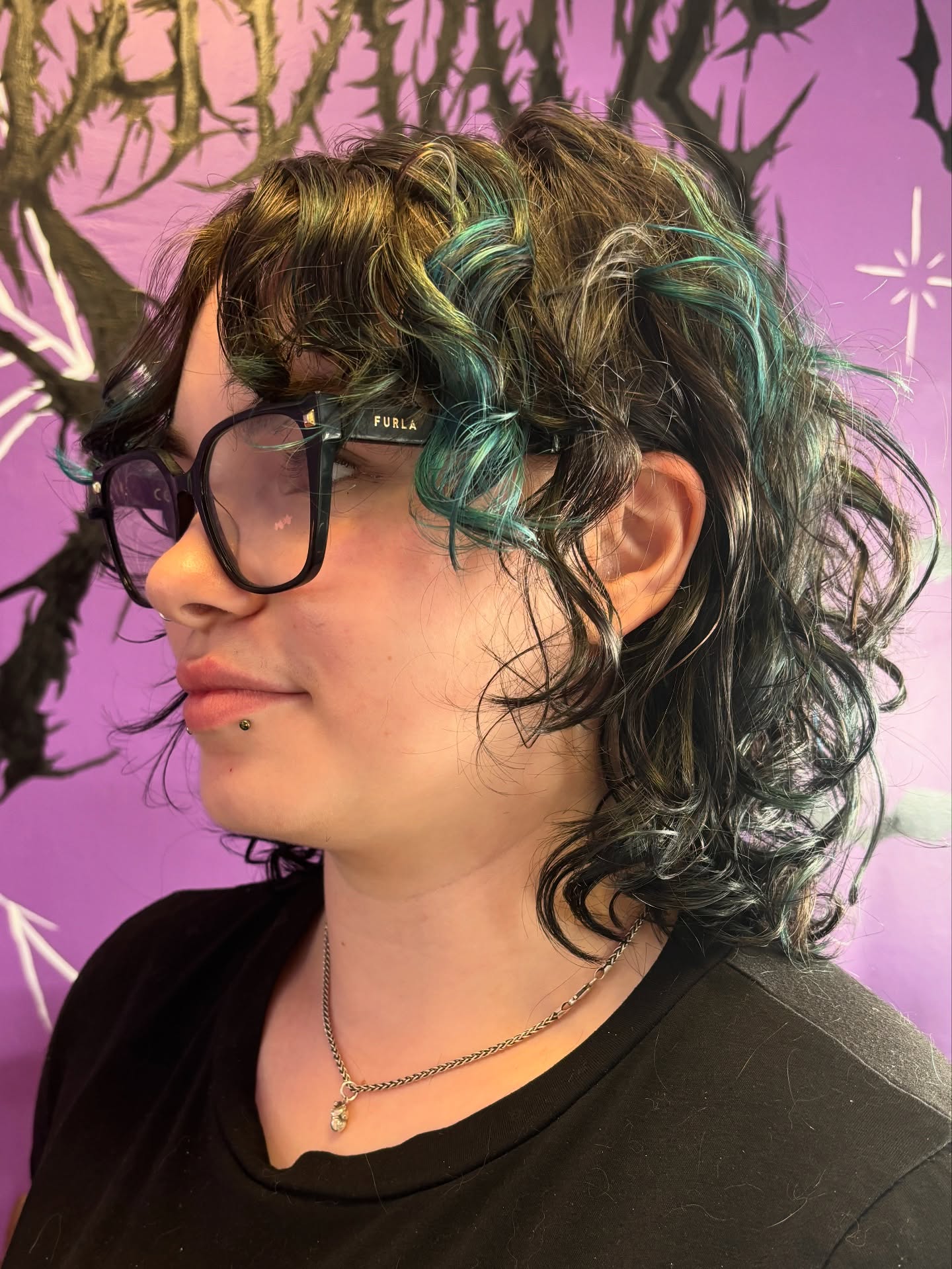 Jaw-Length Choppy Shag with Teal Peekaboo Face-Framing