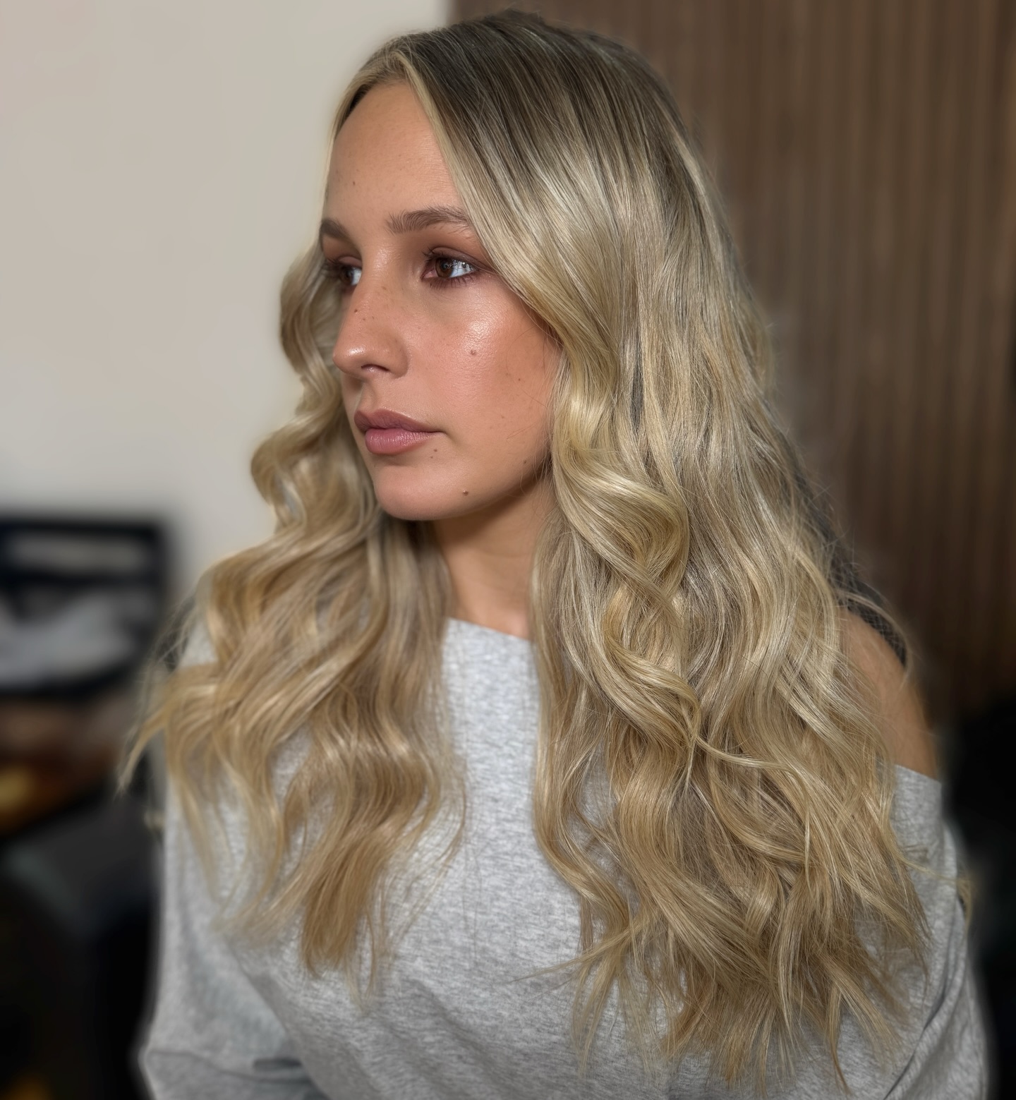 Long Ash-Blonde Waves with Soft Root Melt and Micro Face-Framing