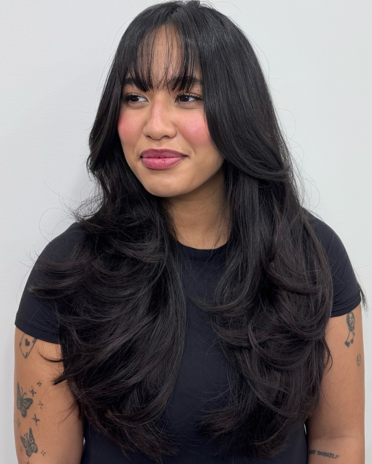 Long Softly Layered Cut with Wispy Blunt Fringe