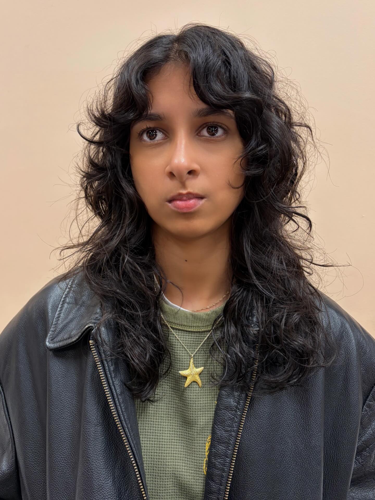 Mid-Length Layered Shag with Curtain-Peak Fringe
