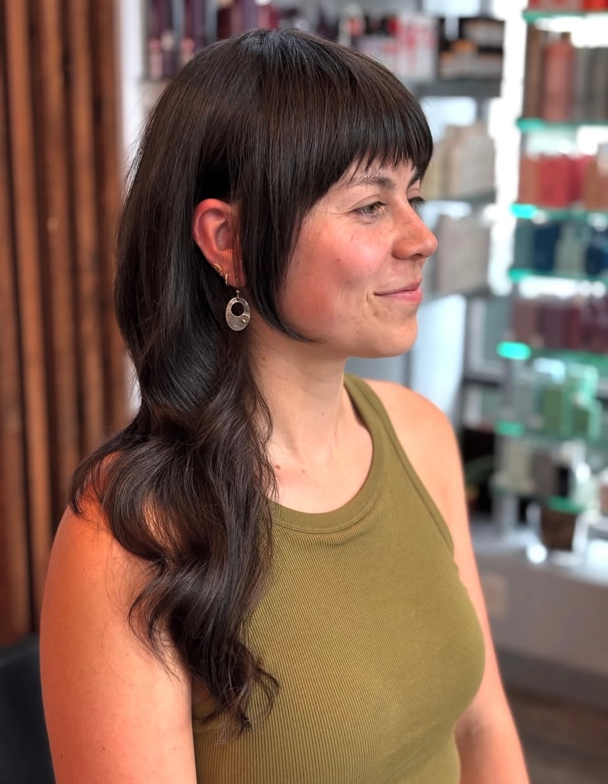 Modern Mullet with Micro-Bangs and Cheek-Grazing Face Frames