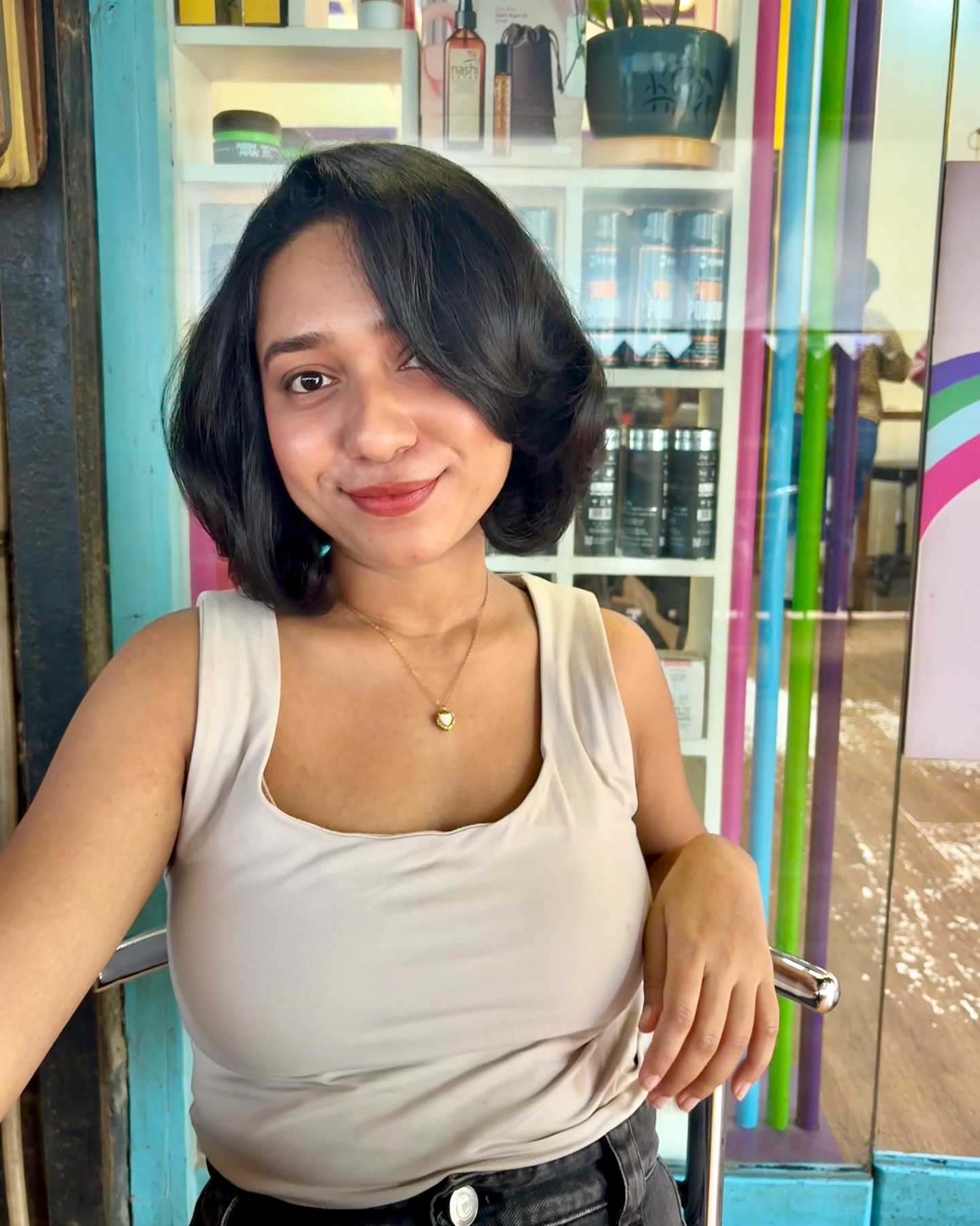 Rounded Chin-Length Blowout Bob with Side-Swept Fringe