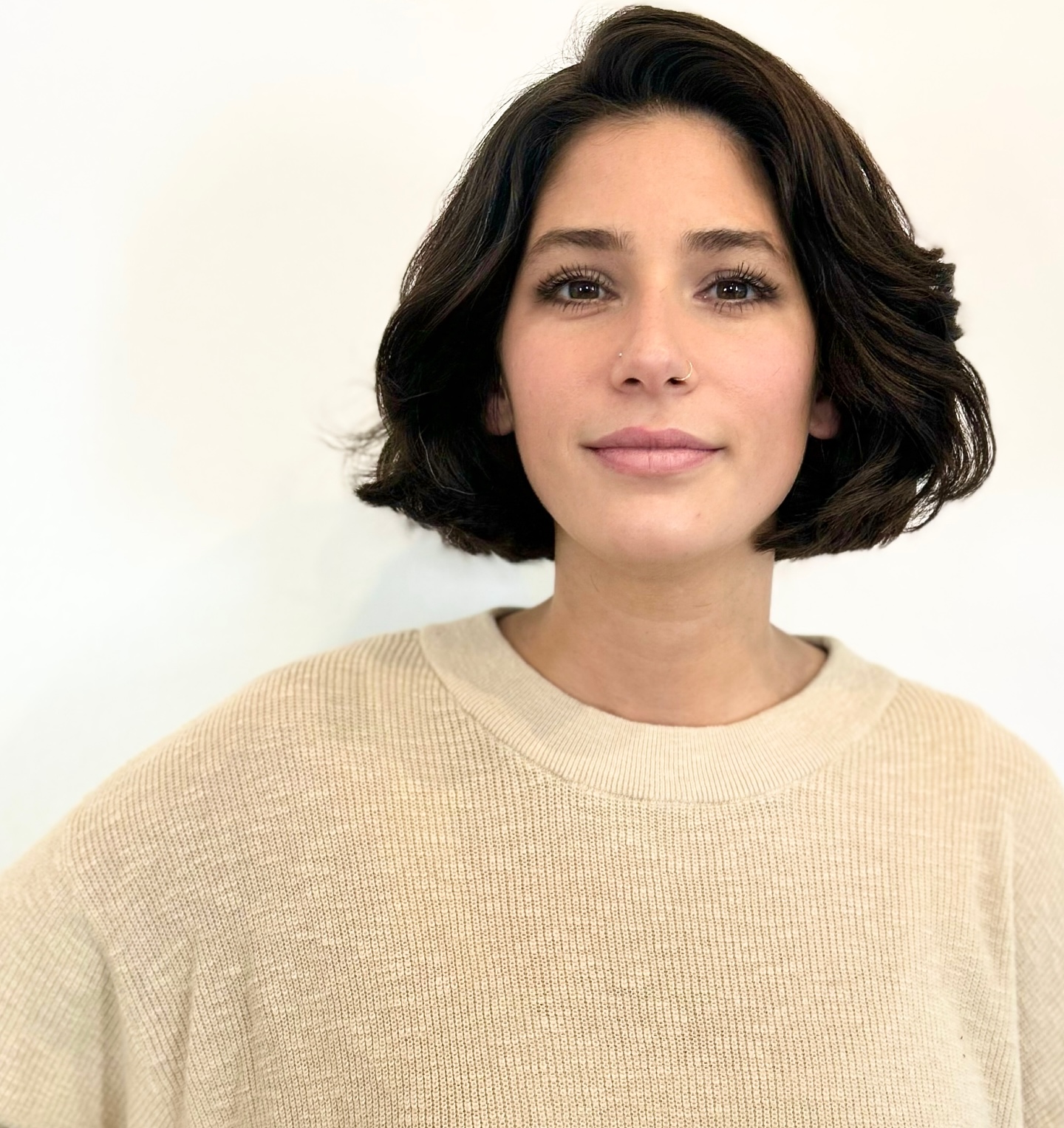 Rounded Chin-Length Bob with Root Lift and Flipped Ends