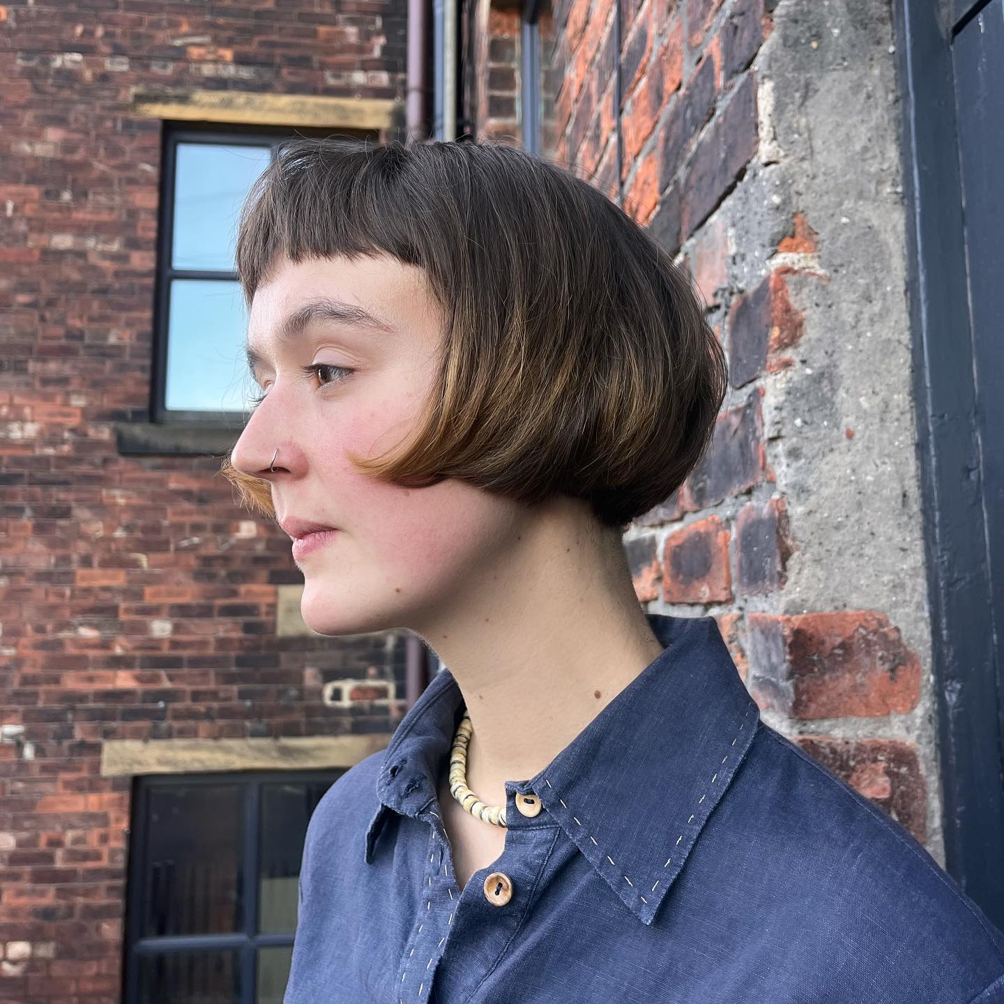 Rounded Chin-Length Bowl Cut with Micro Fringe and Inward Roll