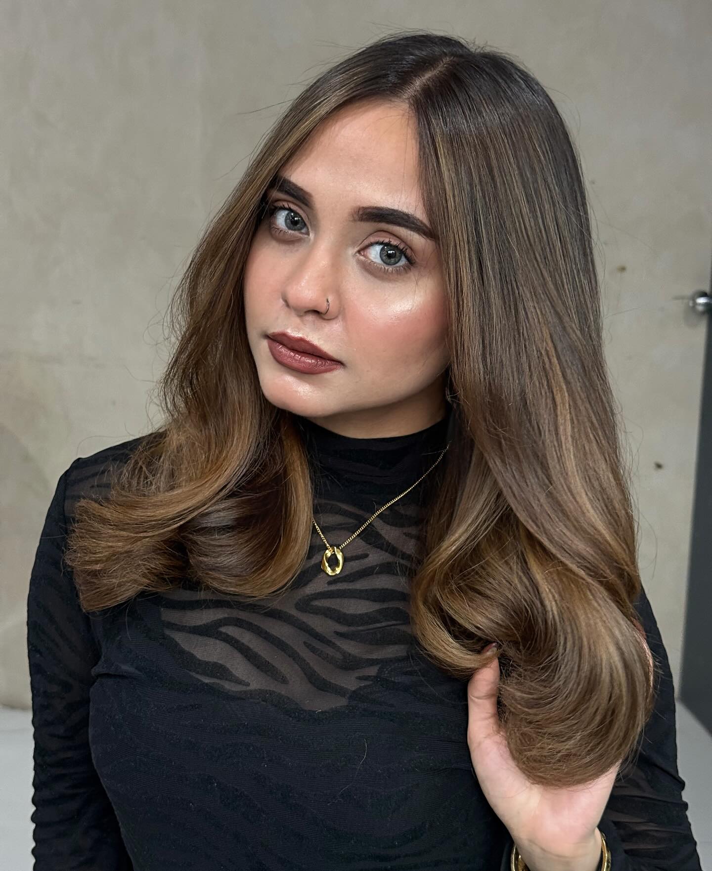 Rounded Long Layers with Center Part and Soft Face‑Framing
