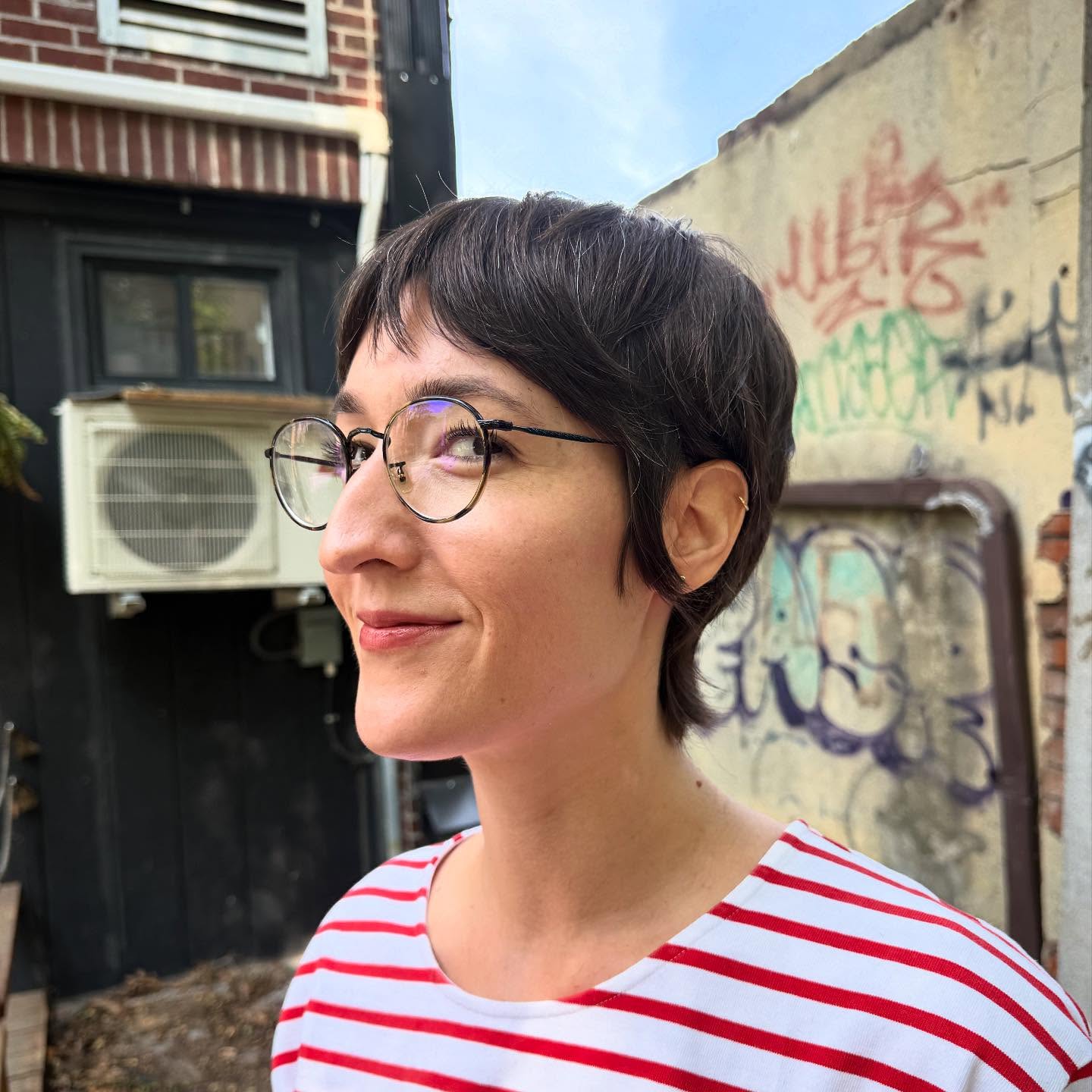 Short Rounded Pixie with Micro Fringe and Temple-Tucked Sideburns