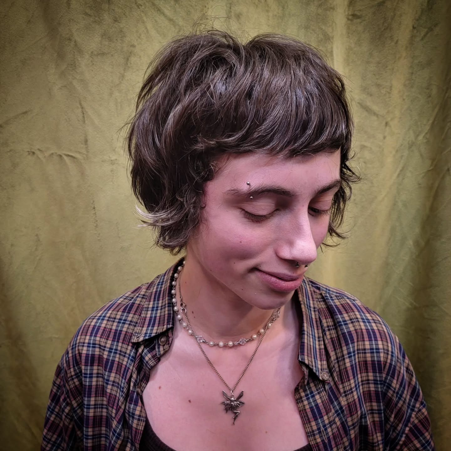 Short Textured Micro-Bang Shag with Peekaboo Blonde Tip