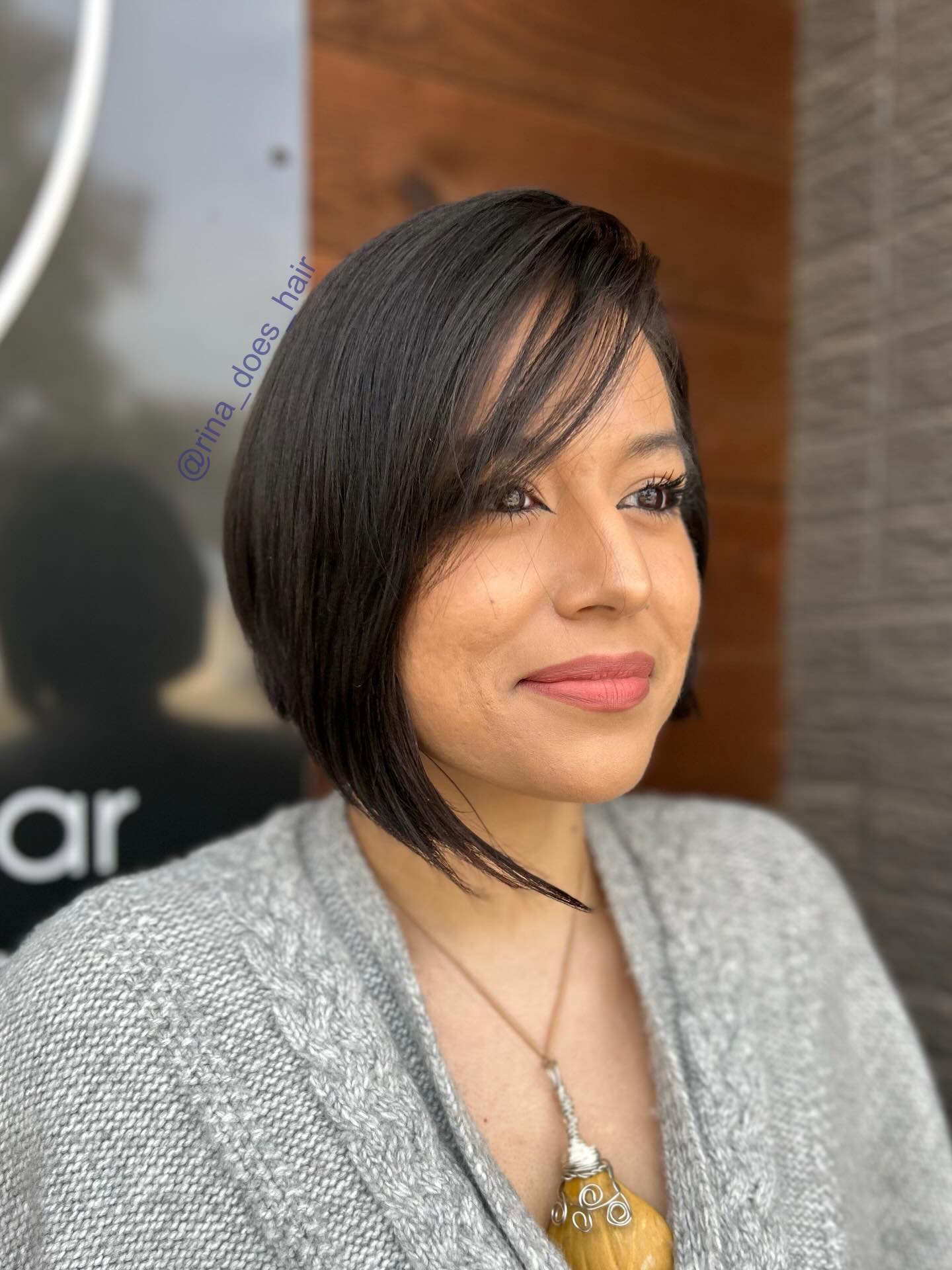 Sleek Diagonal Graduated Chin-Length Bob with Wispy Side Fringe