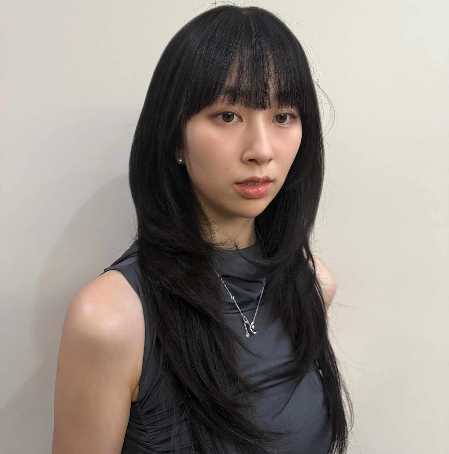 Sleek Long Layers with Blunt Micro-Bang Fringe