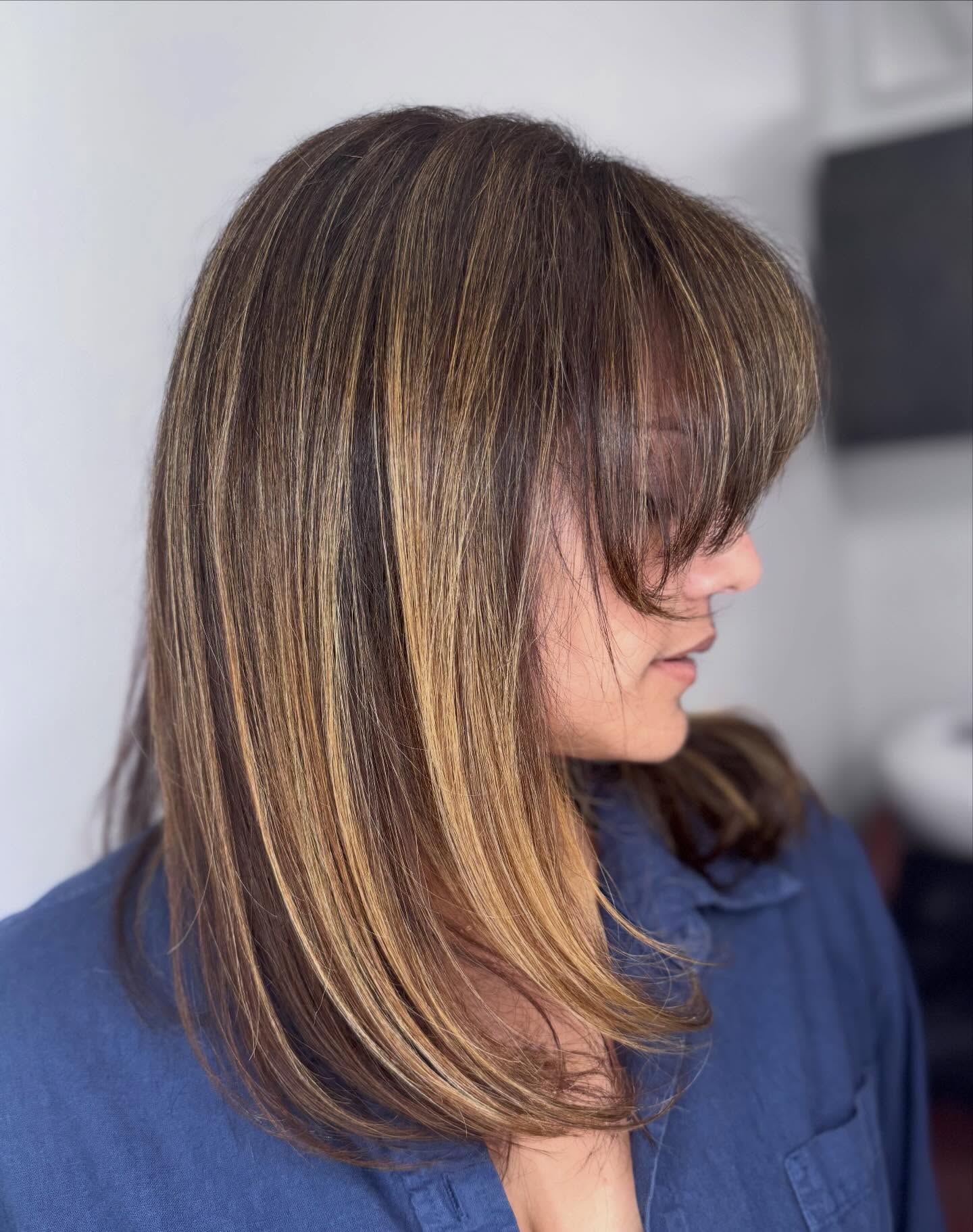 Sleek Mid-Length Layered Cut with Soft Carved Bangs