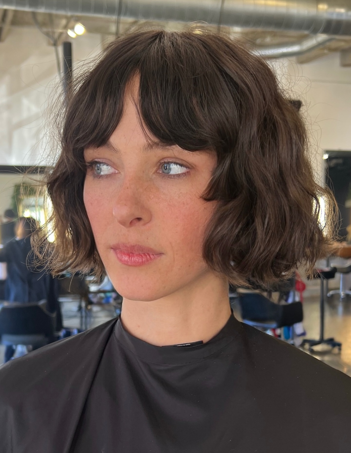 Soft Chin-Grazing Bob with Curved Curtain Bangs