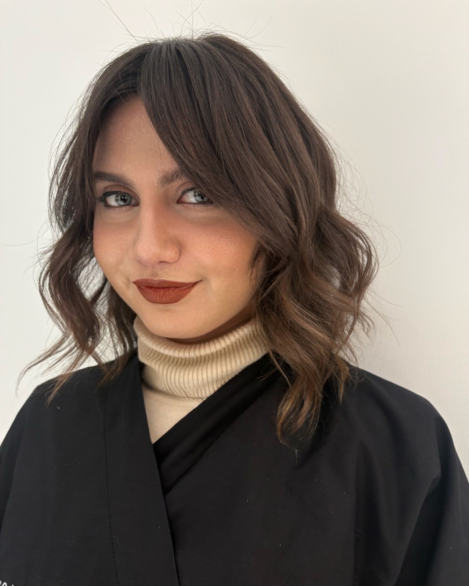 Soft Chocolate Lob with Face-Framing Curtain Bangs