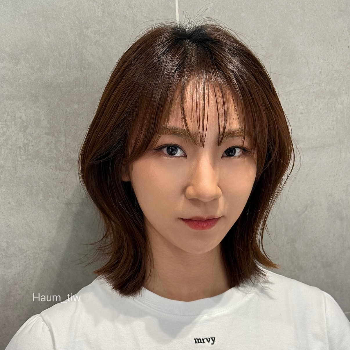 Soft Layered Shoulder-Length Cut with Wispy See-Through Bangs