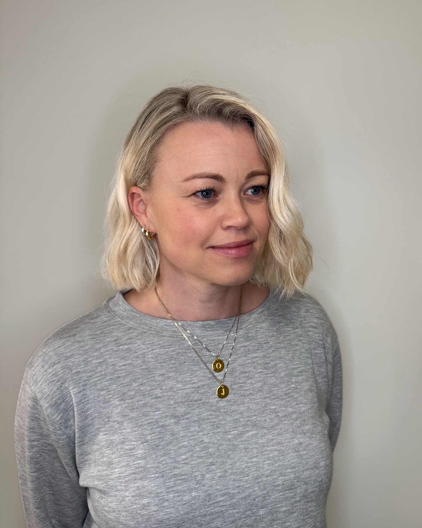 Soft Textured Short Lob with Subtle Root Melt and Side-Swept Wave