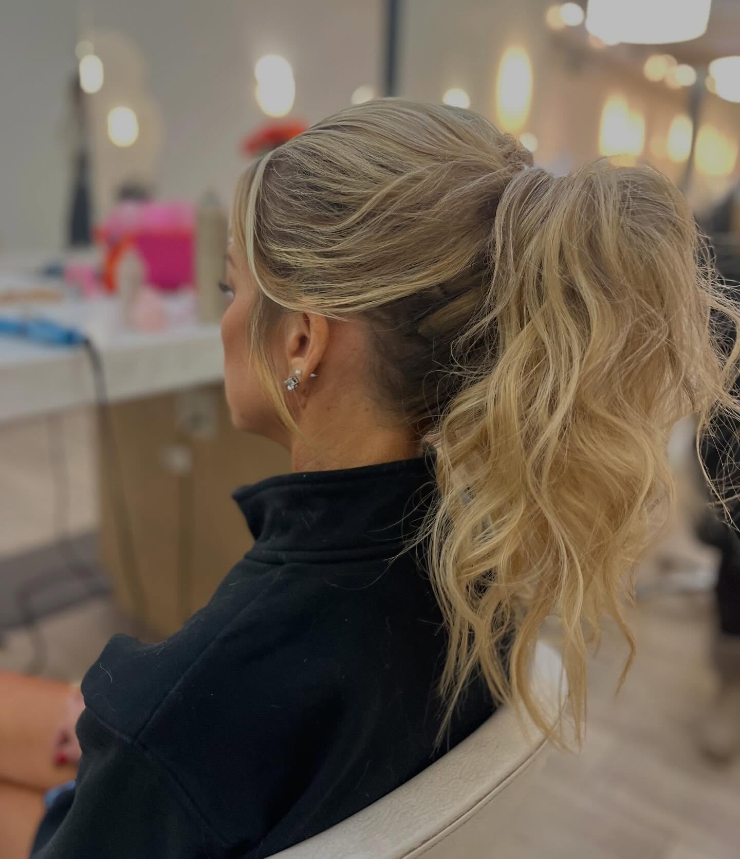 Textured Blonde High Pony with Face-Framing Layers