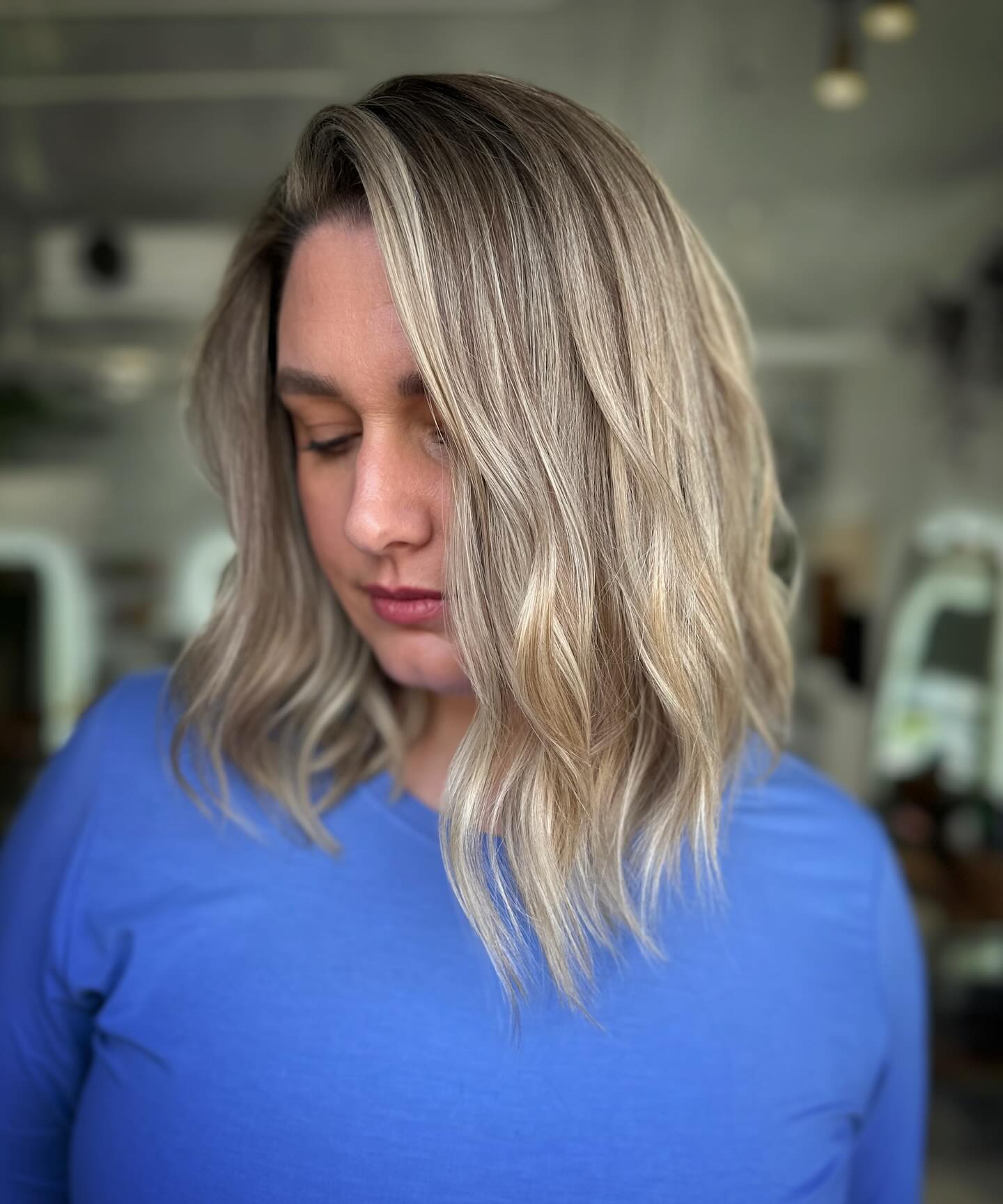 Textured Cool-Blonde Collarbone Lob with Bright Face-Framing Slice