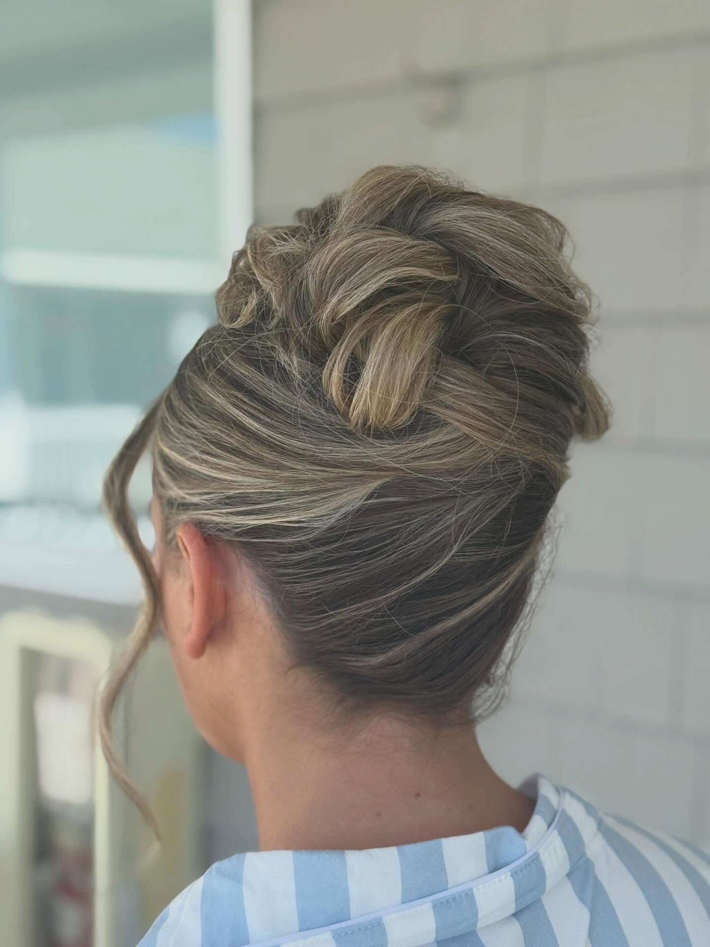 Textured Twisted Updo with Painted Ash-Blonde Highlights