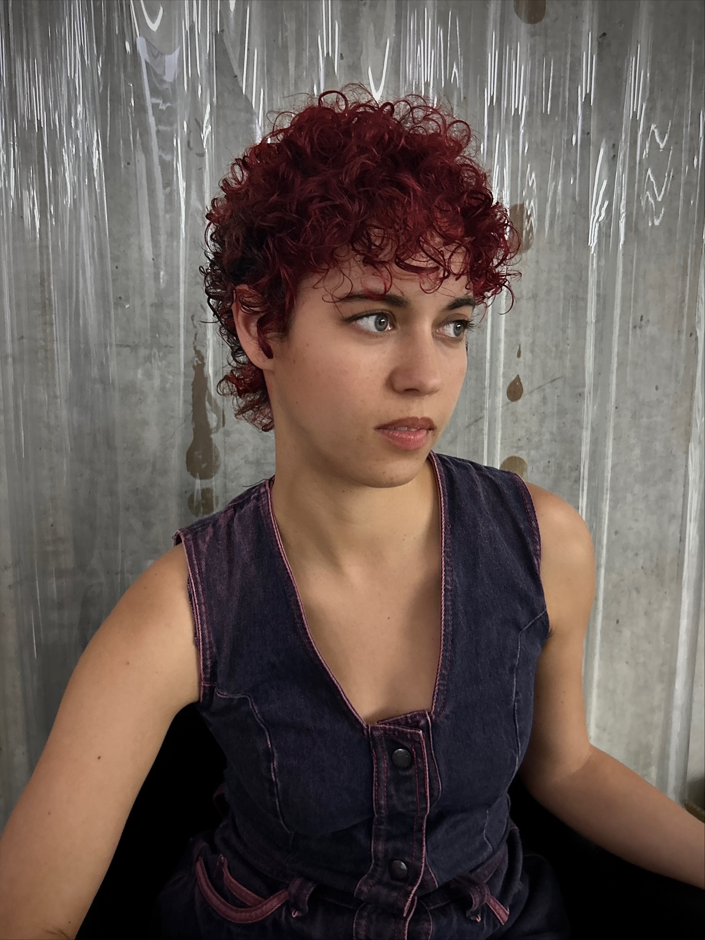Tight Curly Burgundy Pixie with Tapered Nape