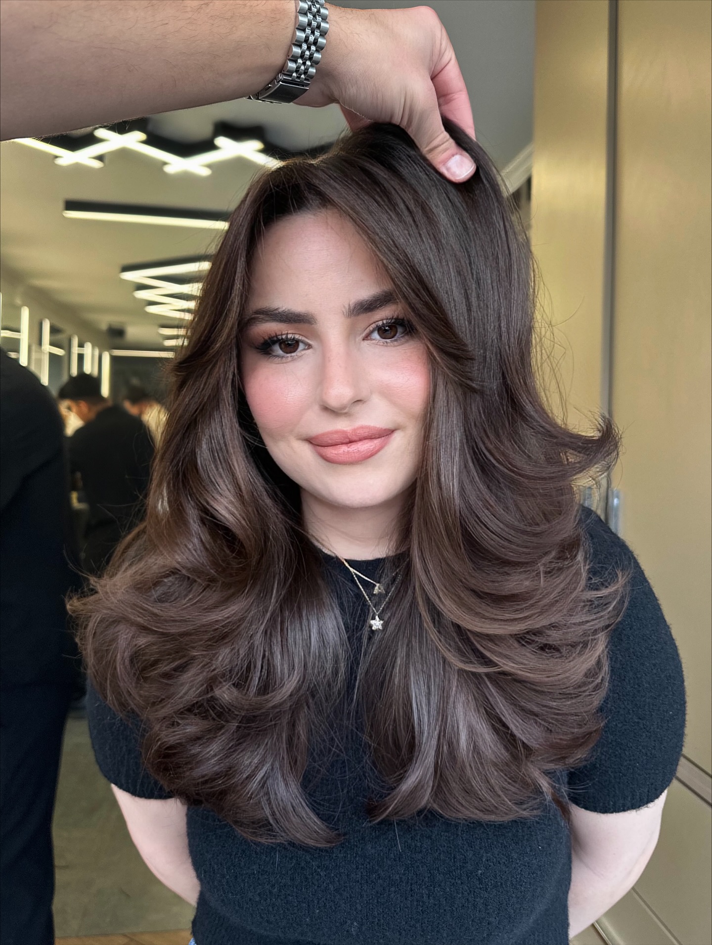 Voluminous Chocolate Brunette Layered Blowout with Face-Framing Swoop