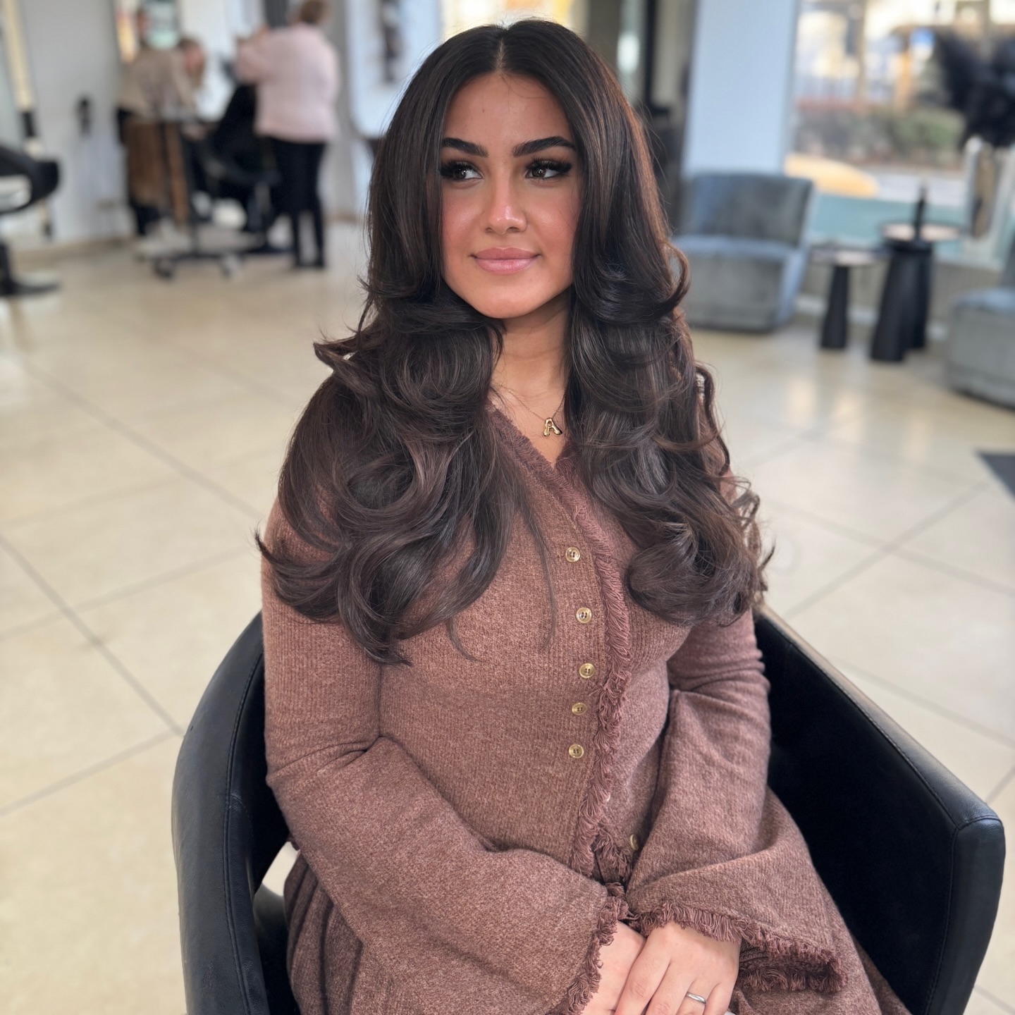 Voluminous Long Layered Blowout with Sculpted Face-Framing