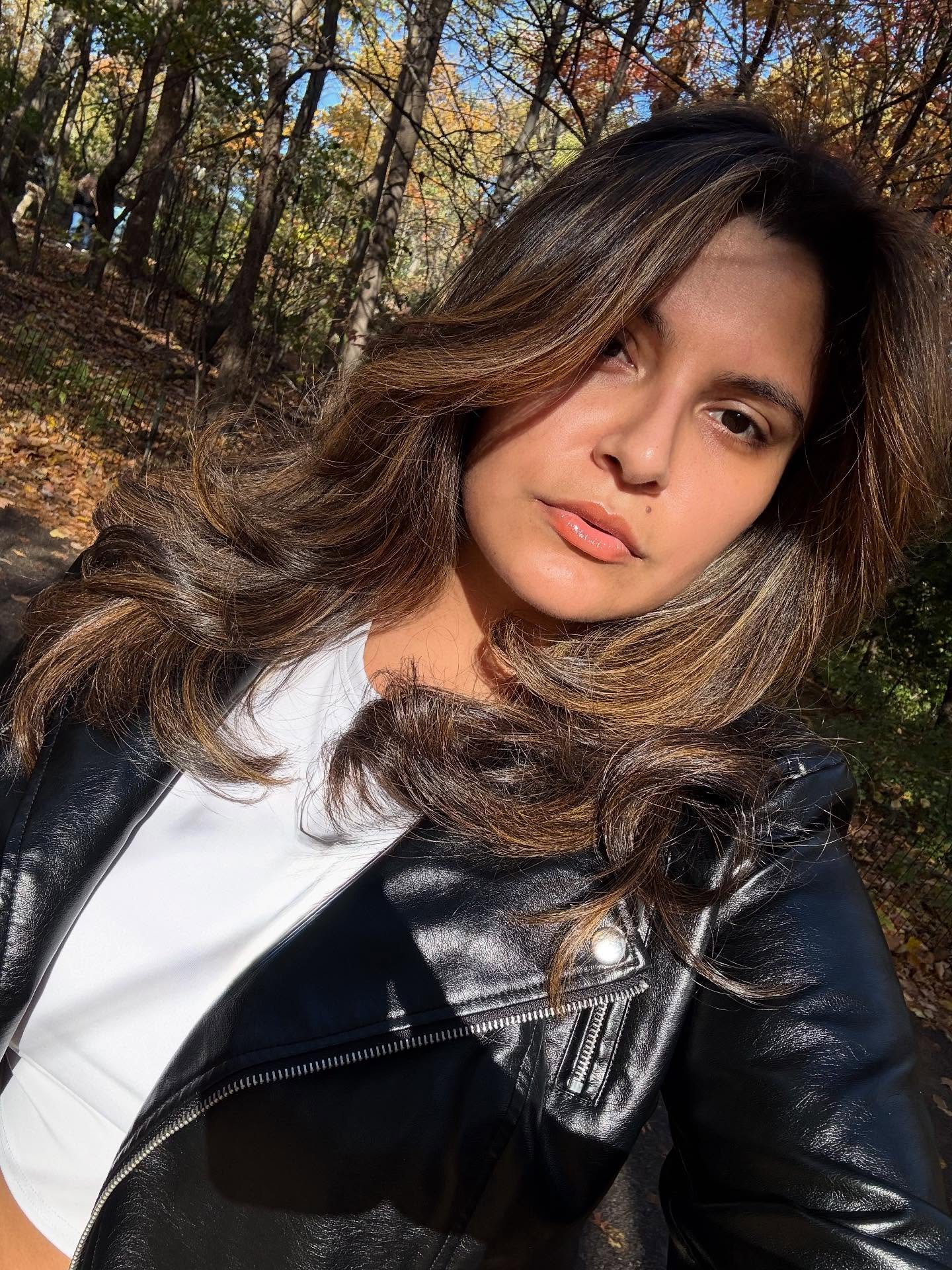 Warm Caramel Face-Framing Feathered Layers with Root Melt