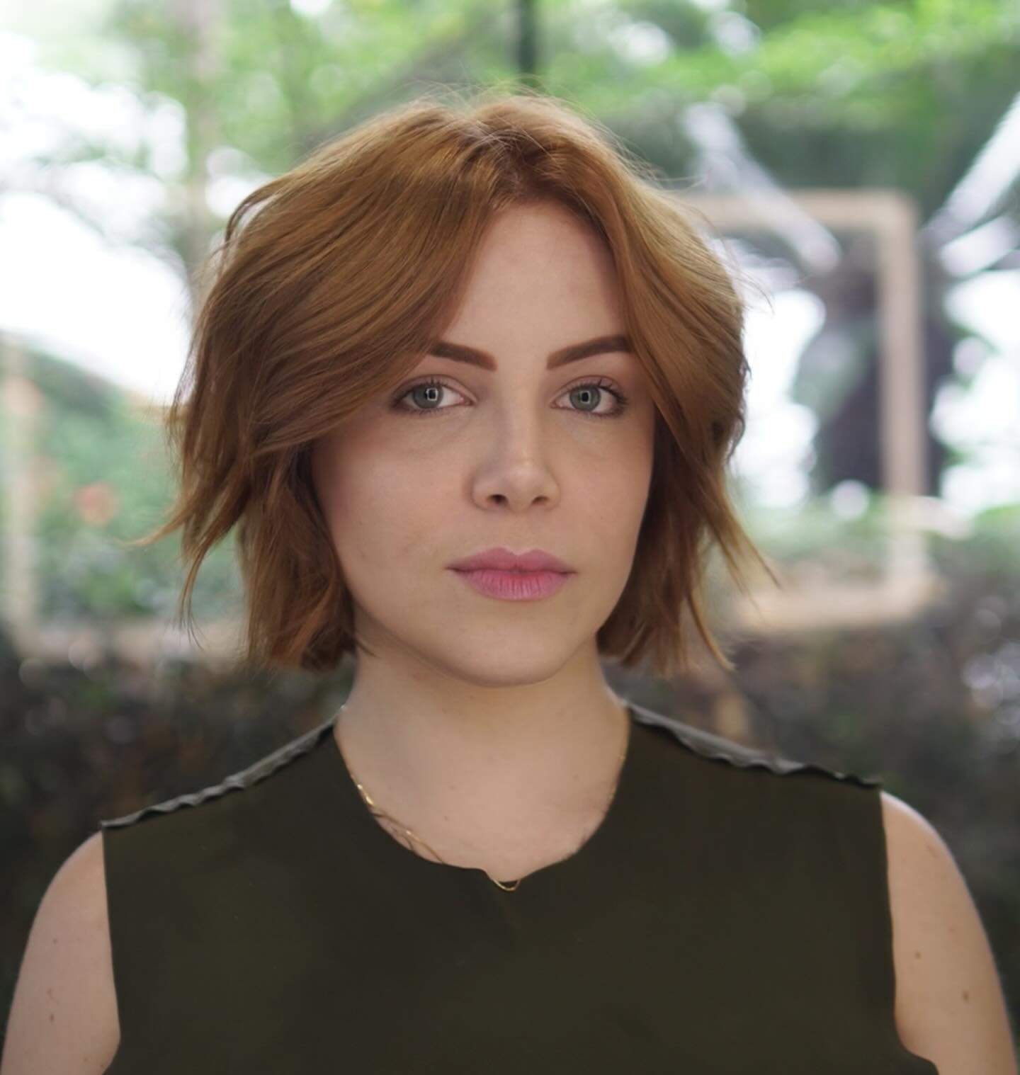 Warm Copper Textured Chin-Length Bob with Curtain Parting