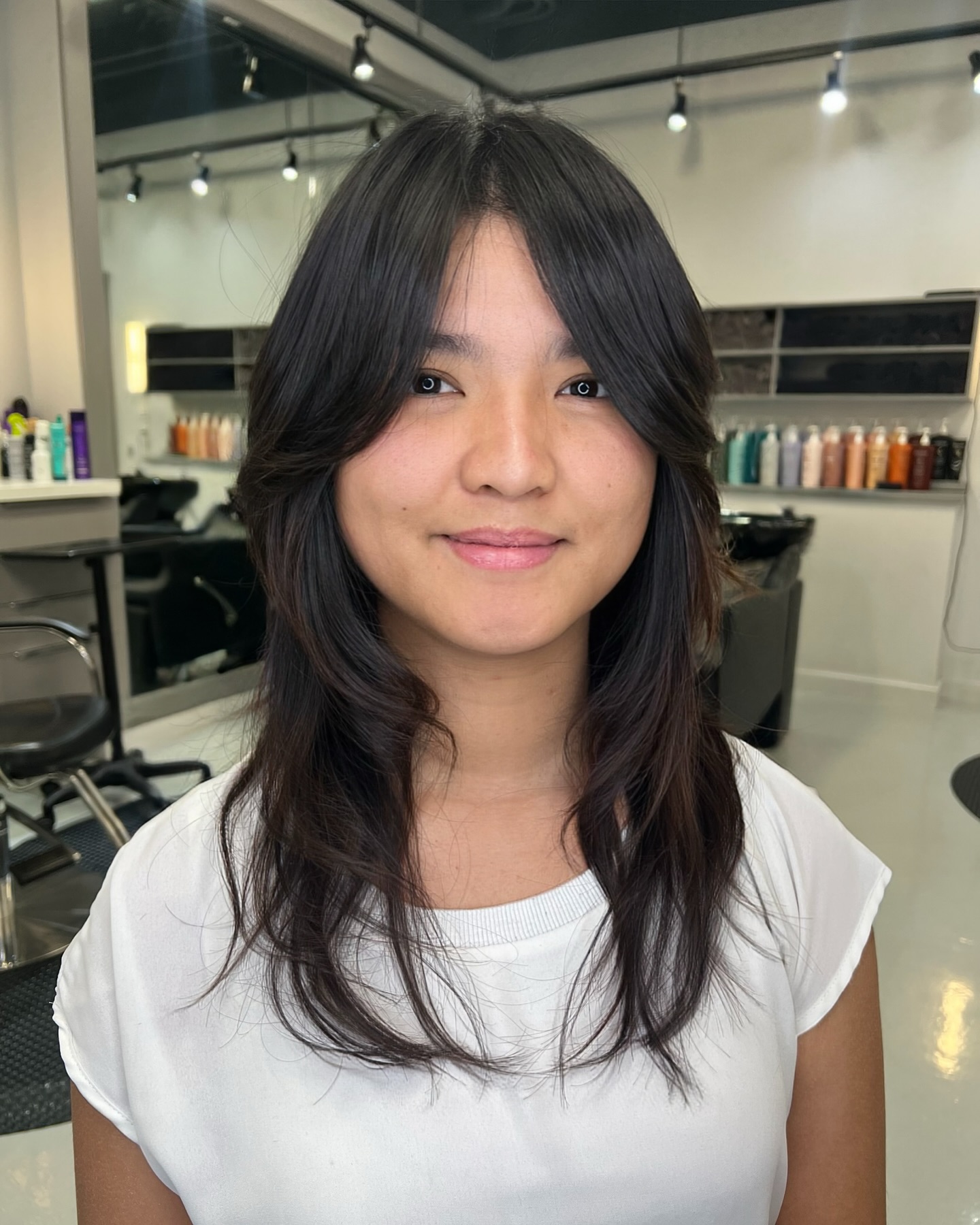Center-Parted Feathered Mid-Length with Curtain Face Frames