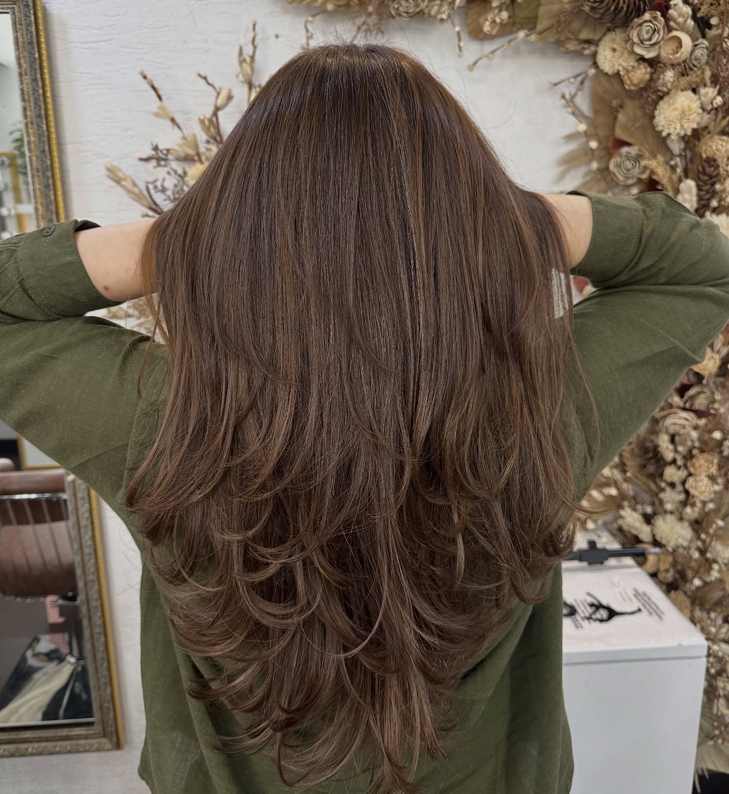 Chestnut Layered Cut with Grey-Threaded Lowlights and Soft Flicks