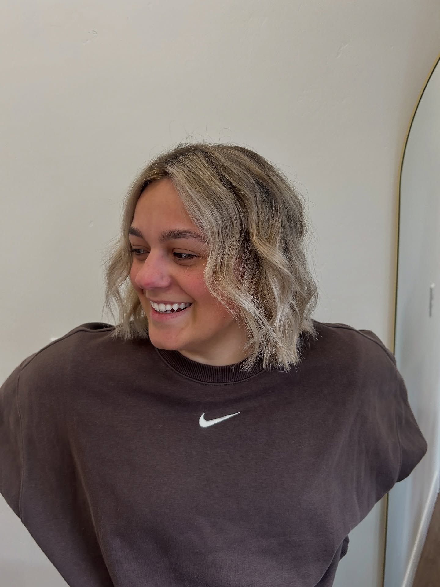 Chunky Textured Chin-Length Blonde Lob with Root Shadow