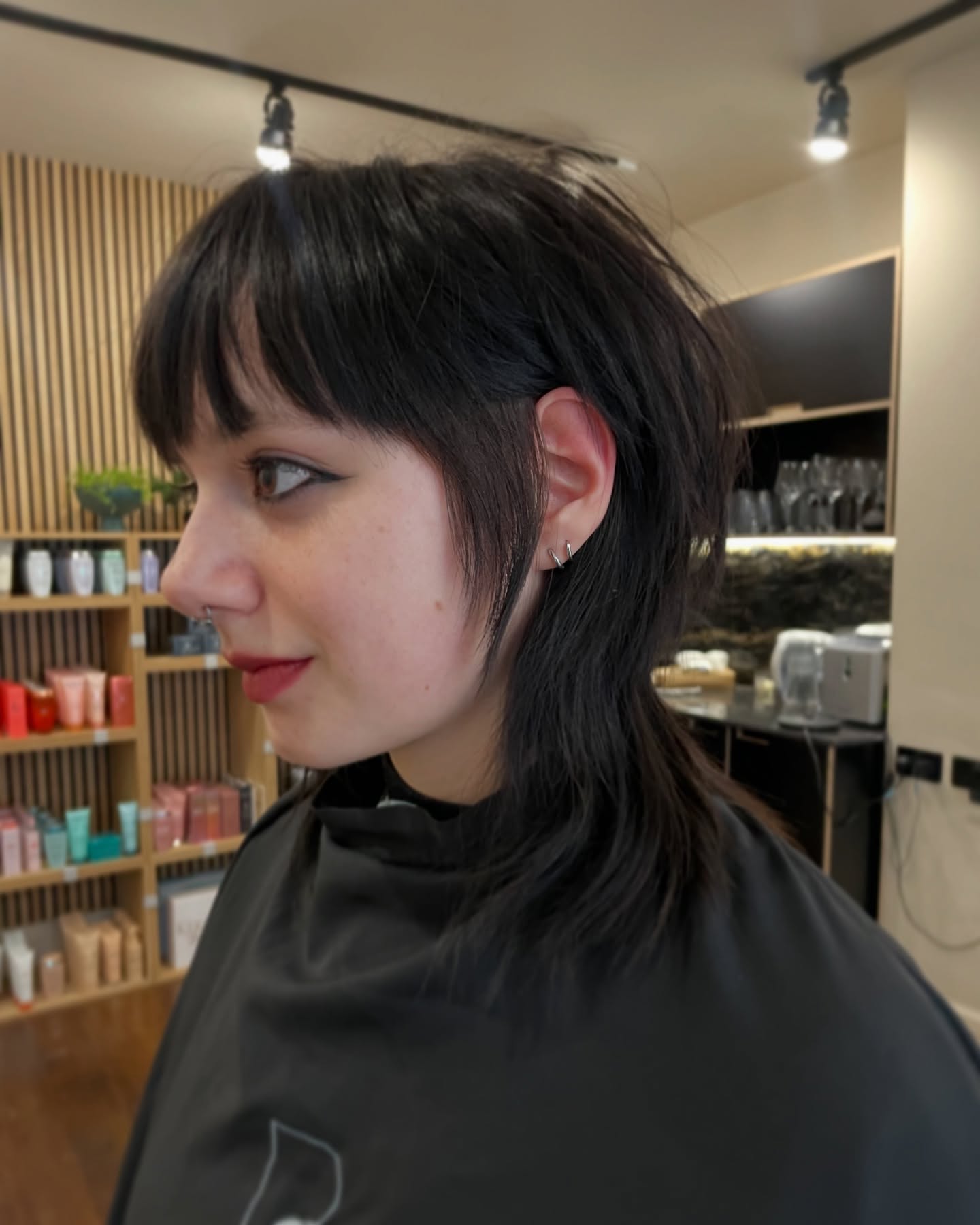 Edgy Textured Mullet with Blunt Fringe and Face‑Framing Tabs