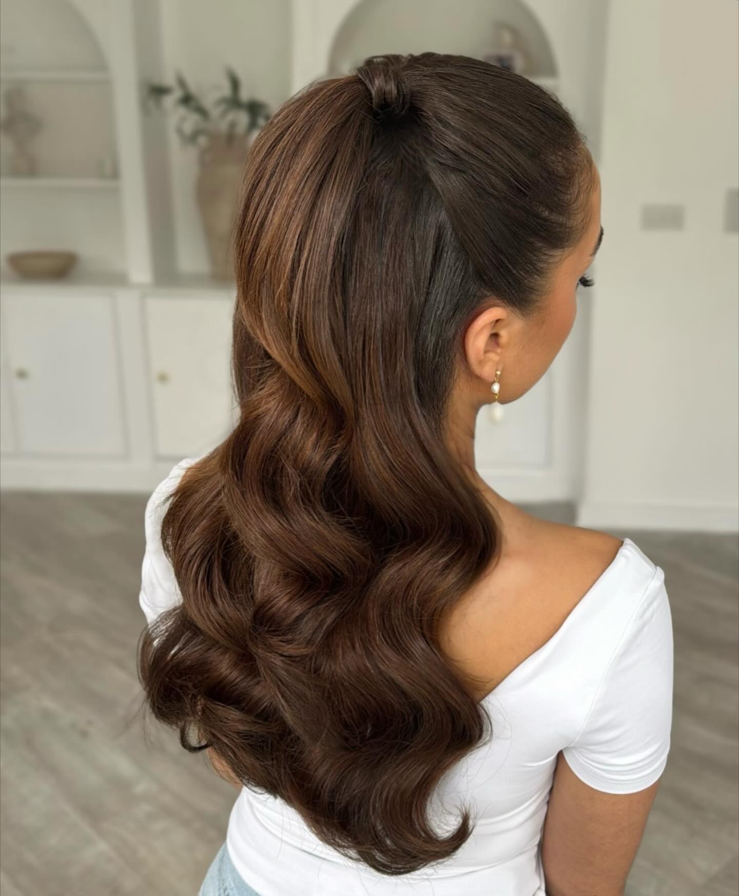 Glam Wrapped High Half-Pony with Glossy Chocolate Waves